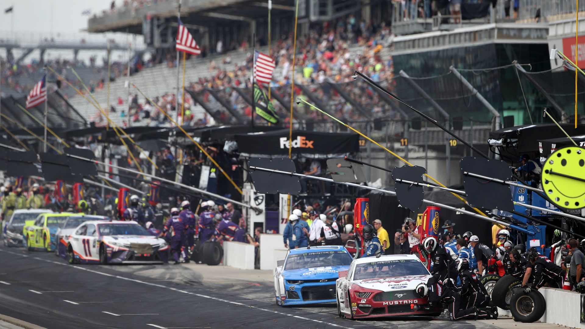 Cars in the pits during a race.