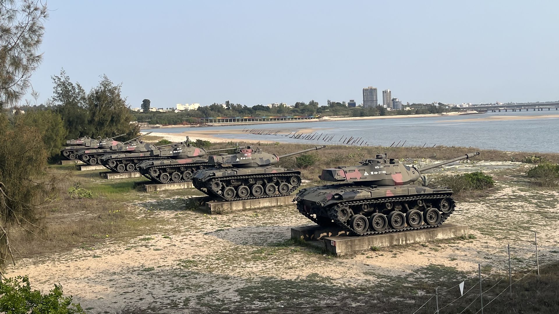 Old tanks are lined up on a beach on Kinmen Island, Taiwan.