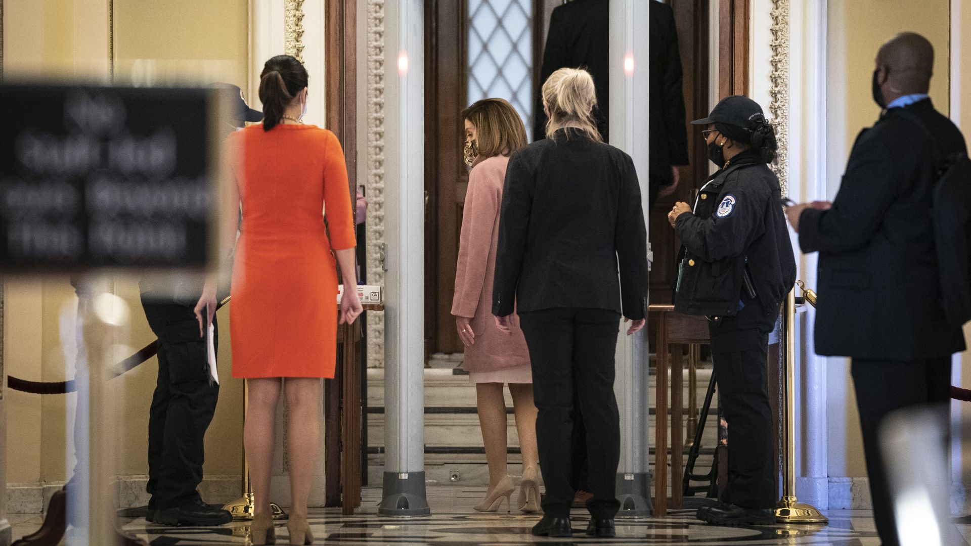 Speaker of the House Nancy Pelosi (D-CA) walks through a metal detector before entering the House Chamber at the U.S. Capitol on January 21, 2021 in Washington, DC. 