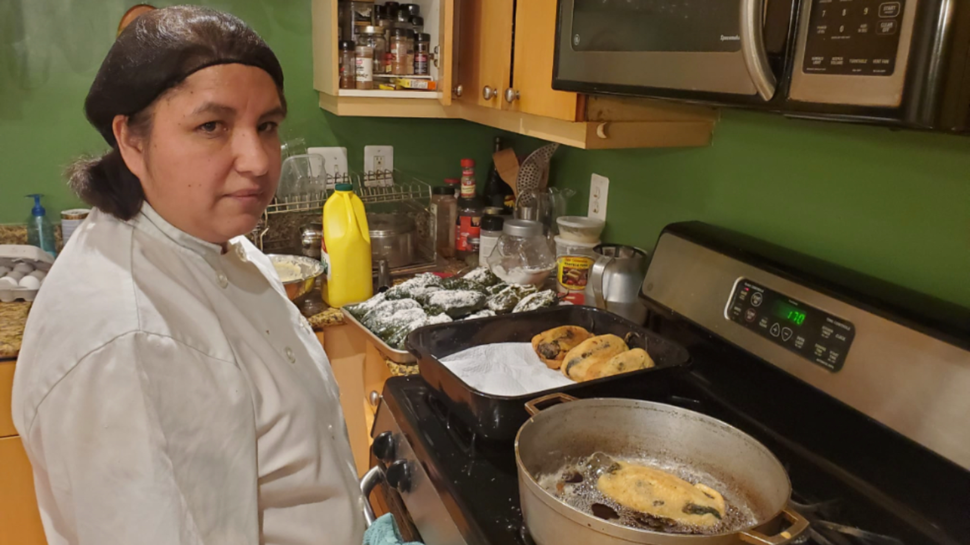 A chef cooking in the kitchen