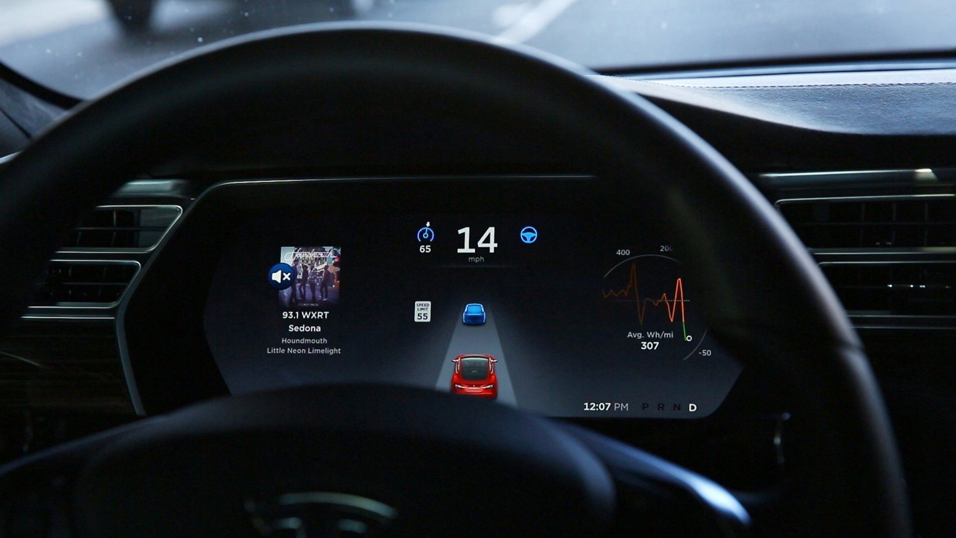 The dashboard of the software-updated Tesla Model S P90D shows the icons enabling Tesla's Autopilot system.