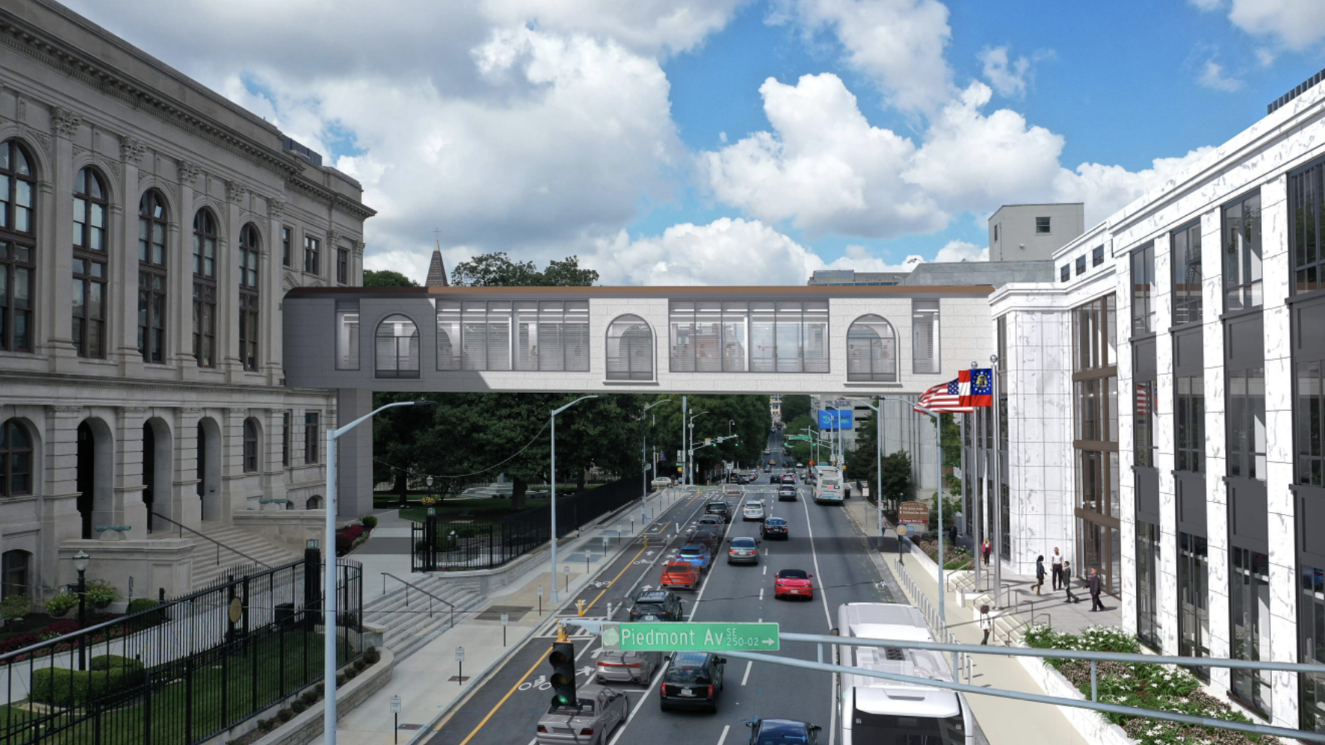 A rendering of an elevated pedestrian bridge over a busy city street connecting a new office building to a historic state Capitol.