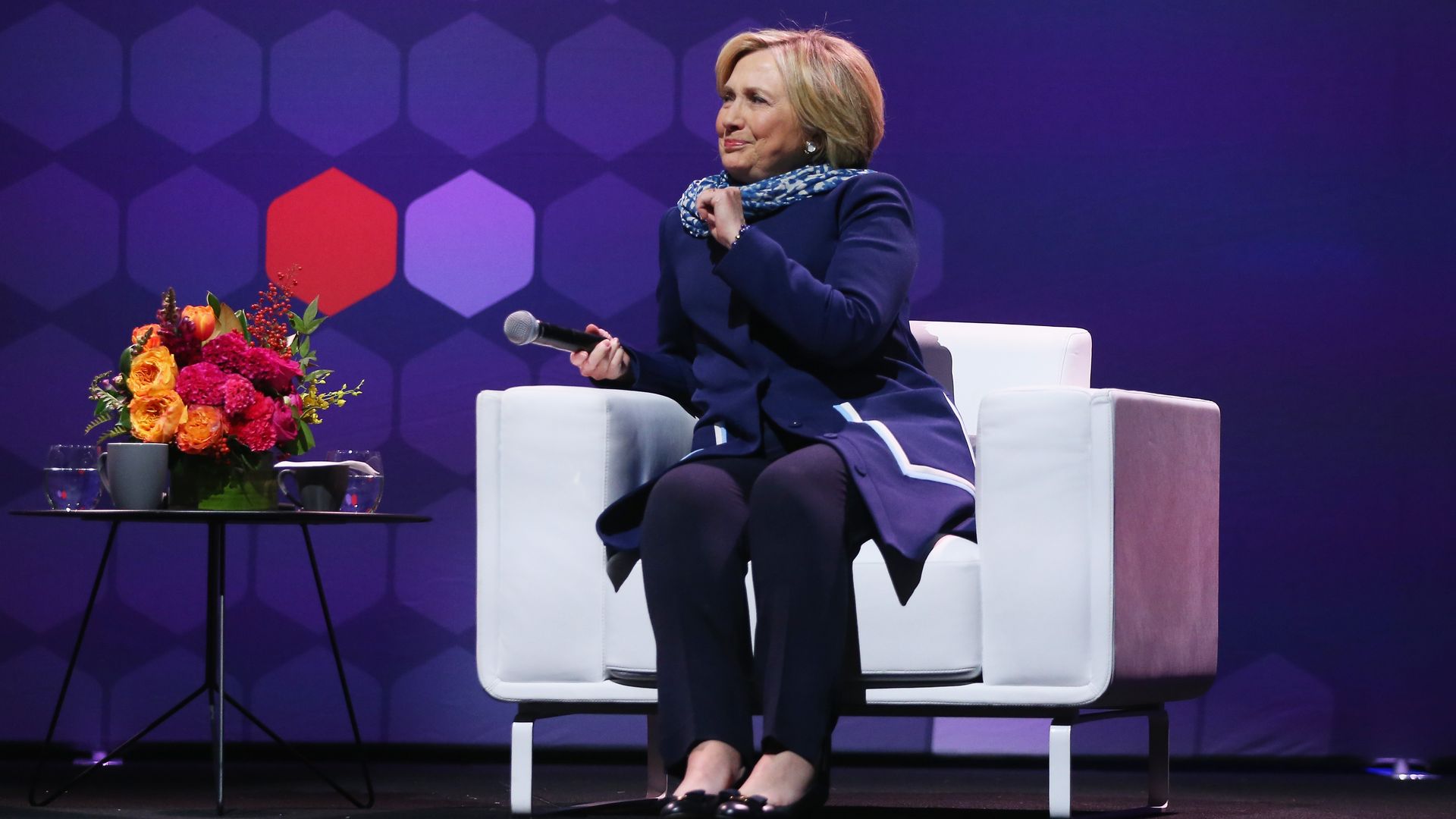 Hillary Clinton sitting.
