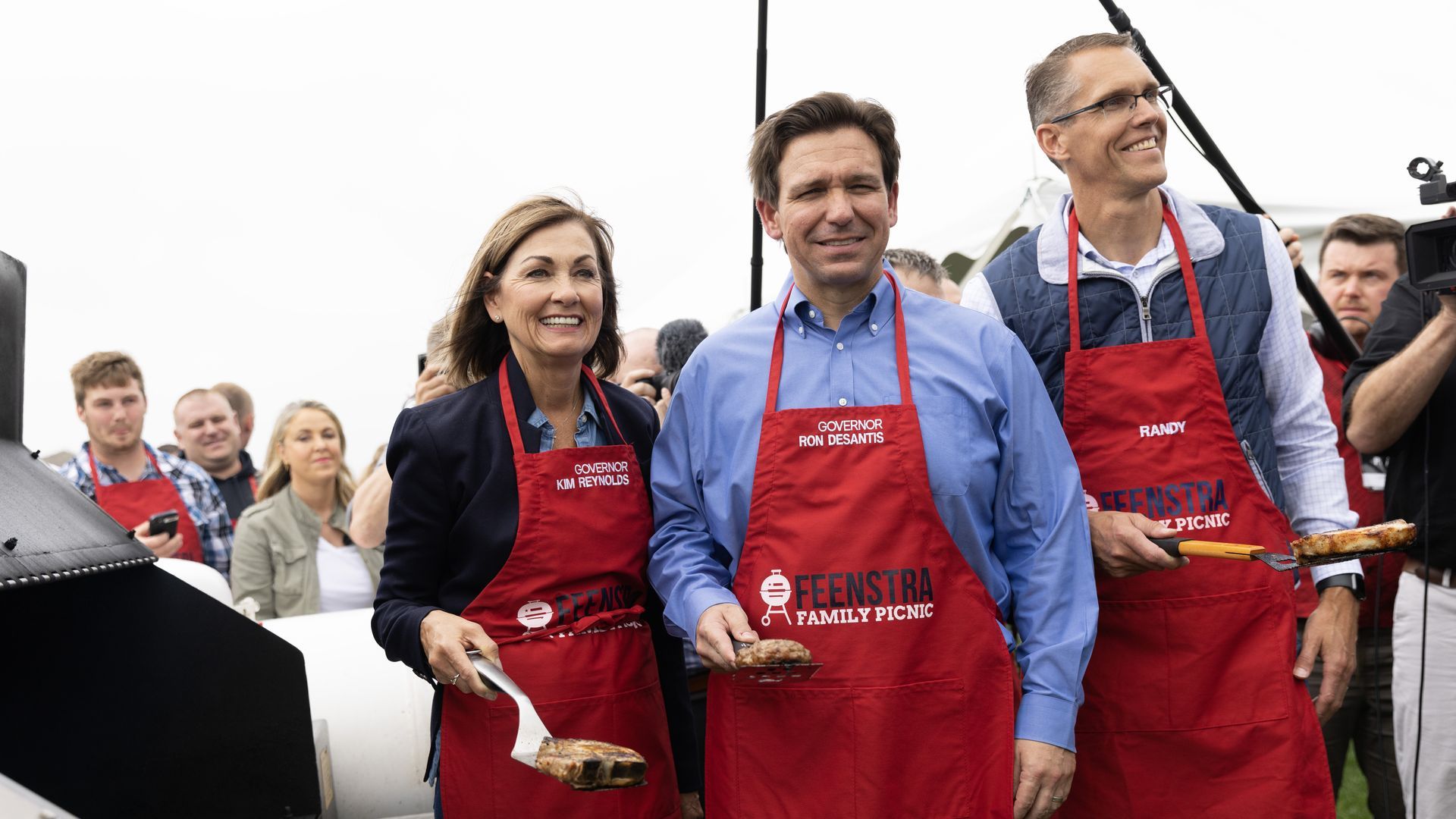 Kim Reynolds, DeSantis and Randy Feenstra