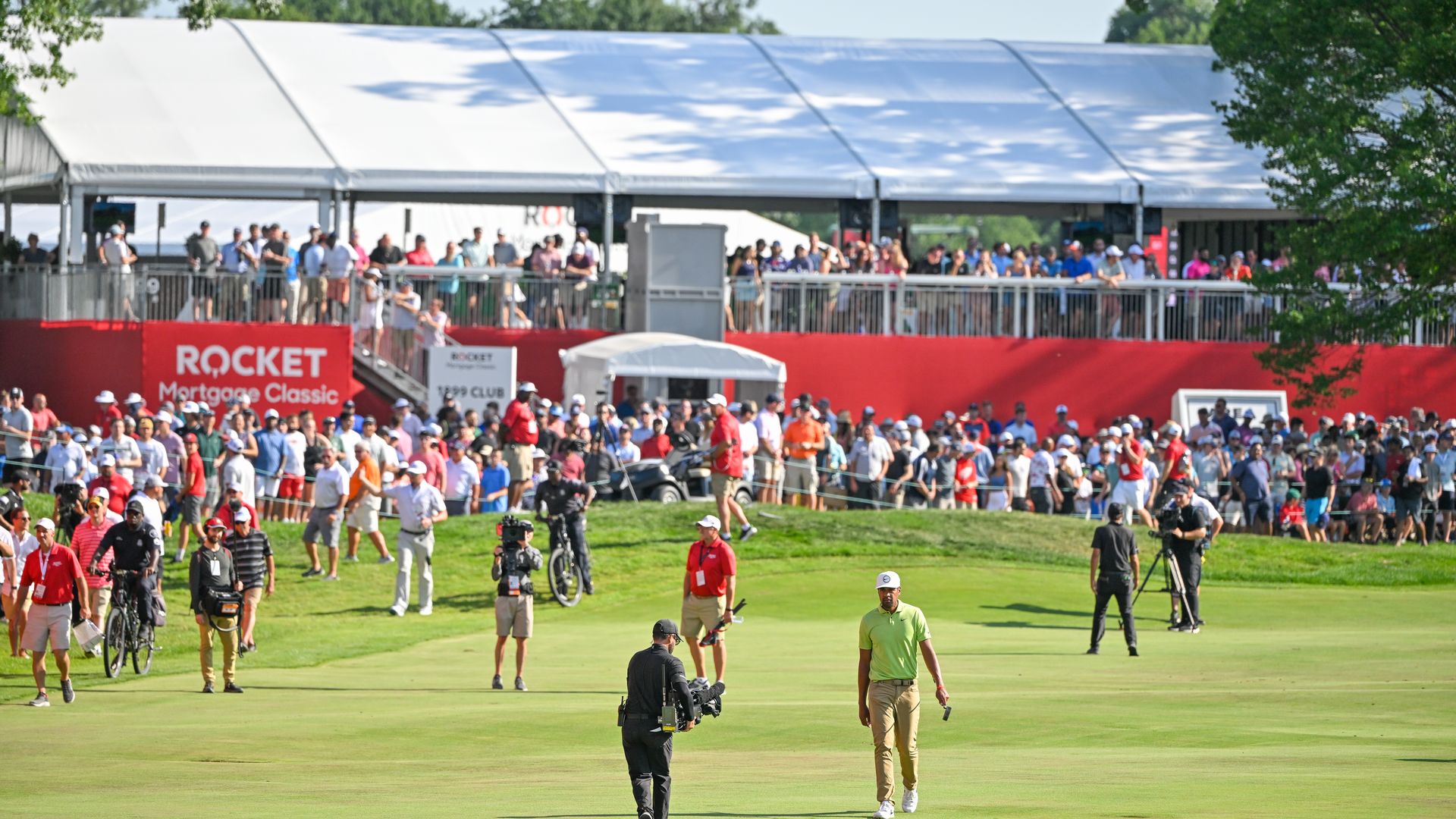 Tony Finau walks the fairway at 2022's Rocket Mortgage Classic