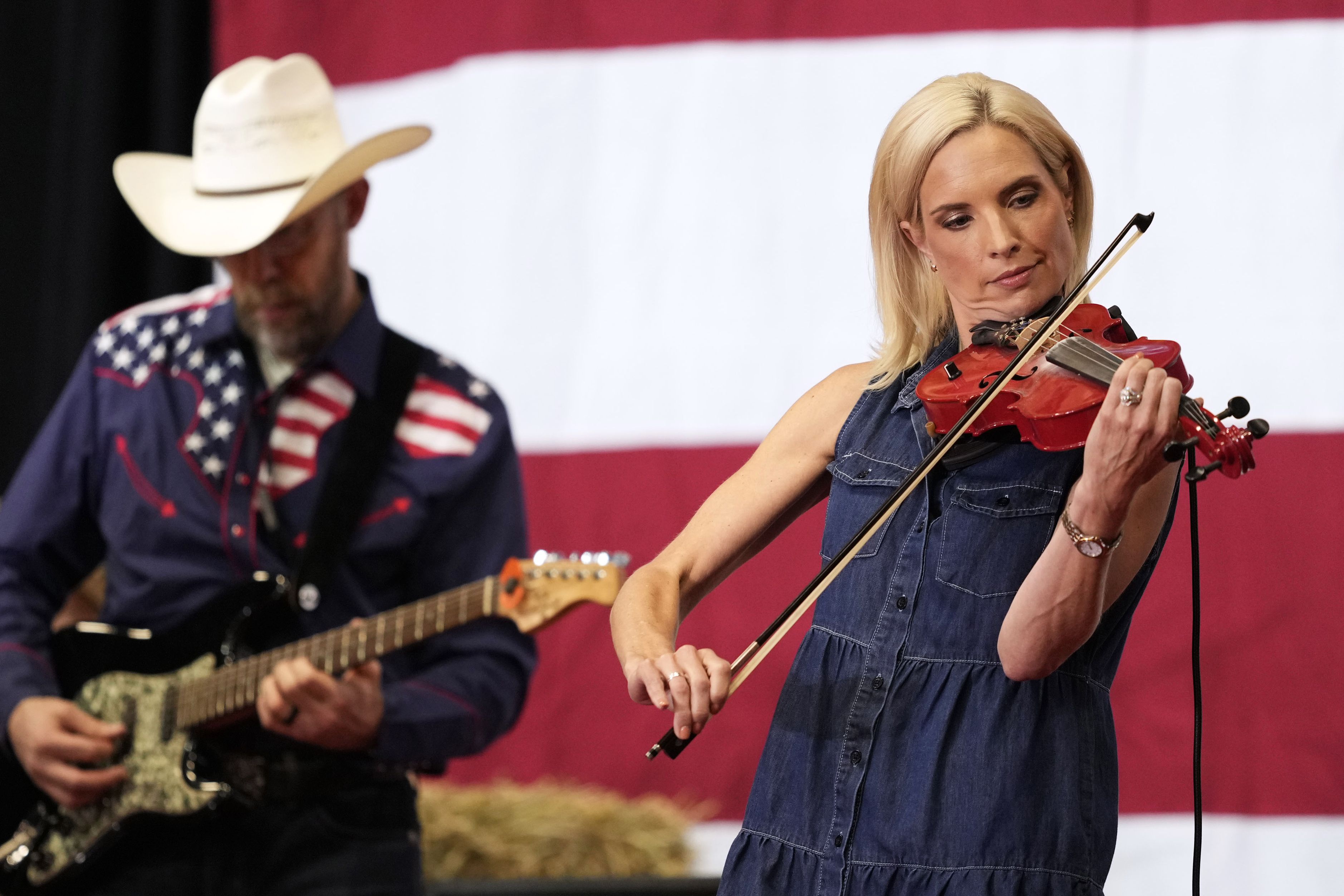 Iowa Republican U.S. Senate candidate, Rep. Ashley Hinson (R-IA) plays the violin during her BBQ fundraiser at the Horizon Events Center on August 29, 2026 in Clive, Iowa. Hinson, running against Democrat state Rep. Josh Turek, is looking to replace retiring U.S. Sen. Joni Ernst (R-IA). (Photo by C