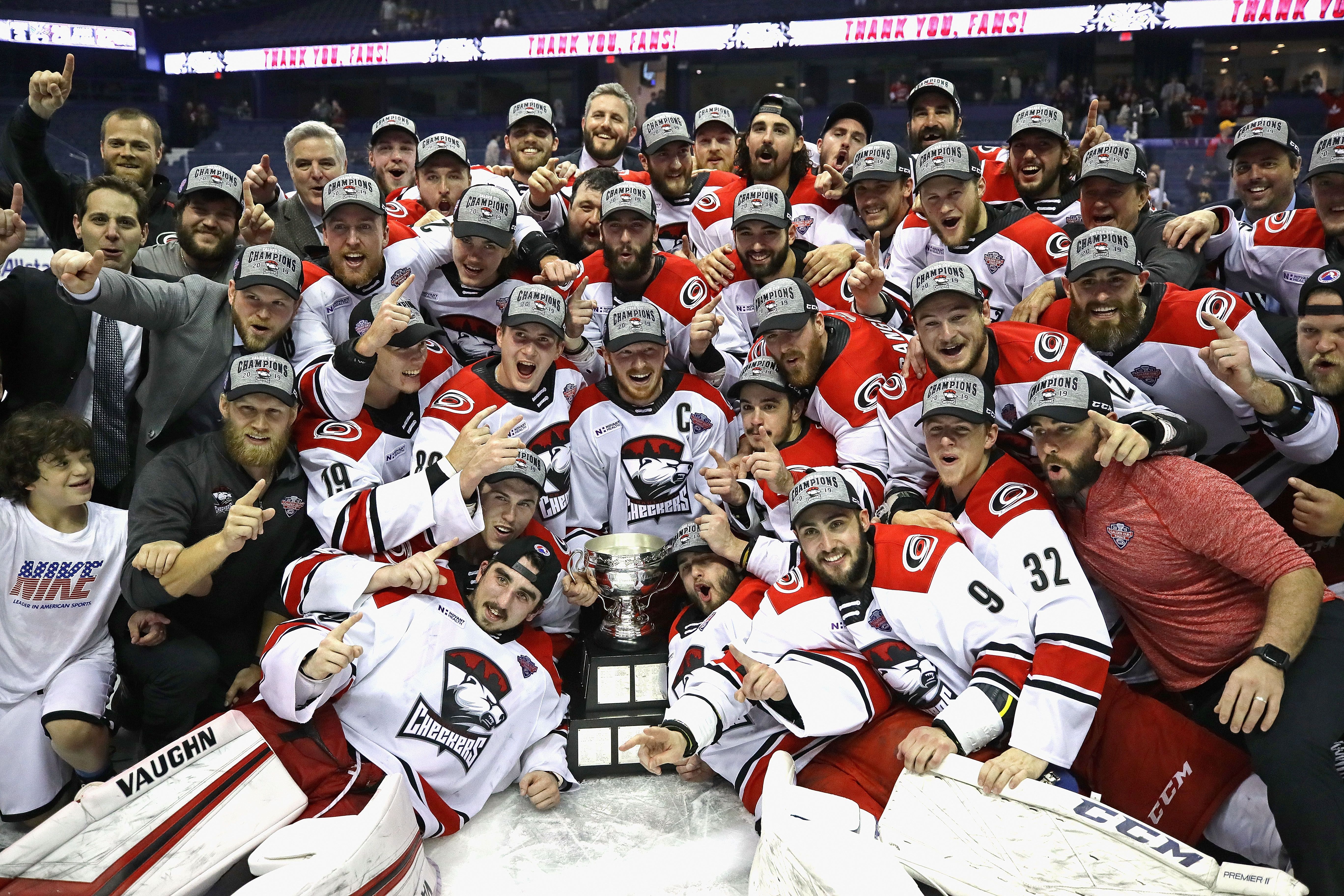 Charlotte Checkers celebrate winning the 2019 Calder Cup. Photo: Jonathan Daniel/Getty Images