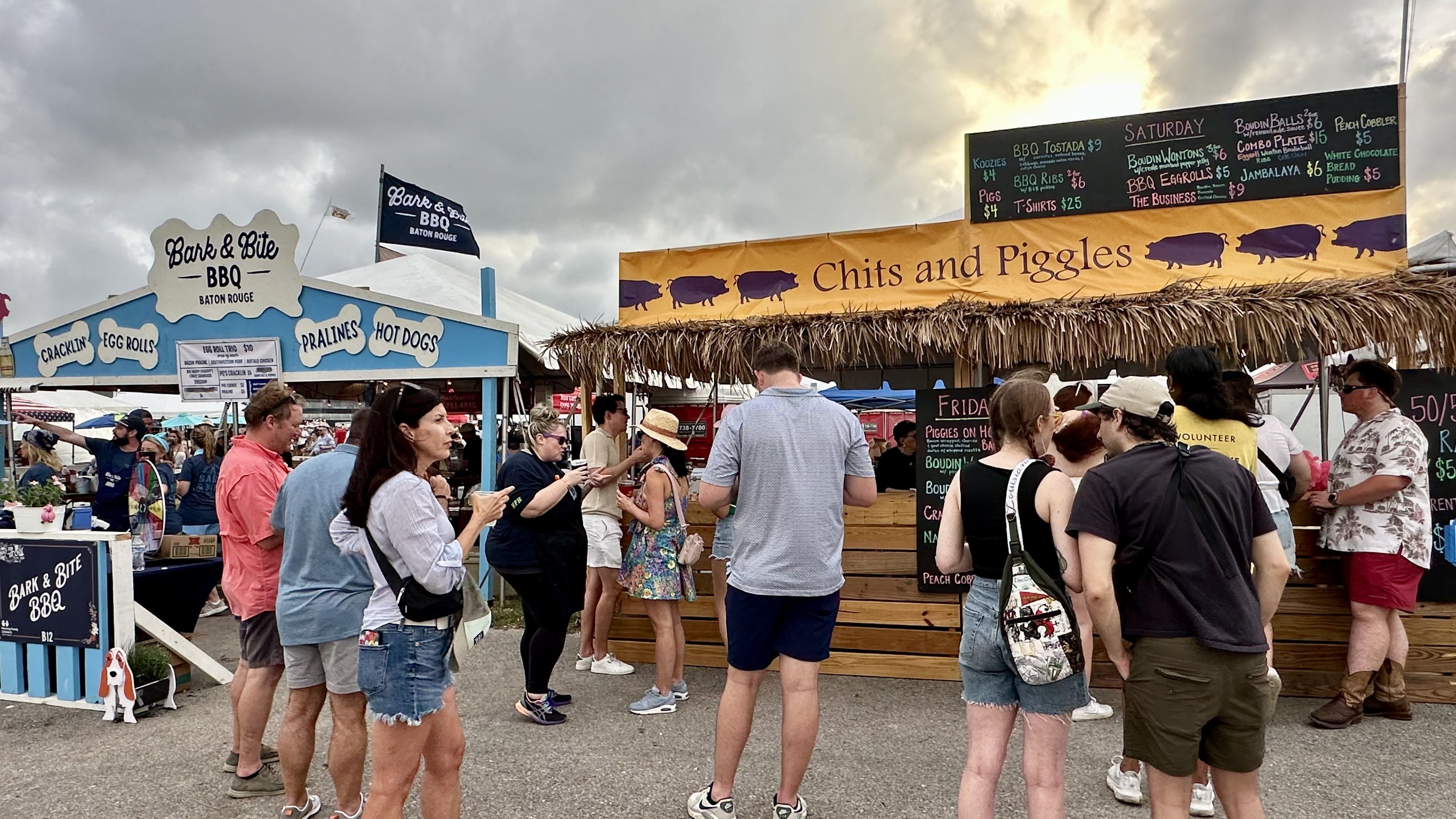 Photo shows booths at Hogs for the Cause