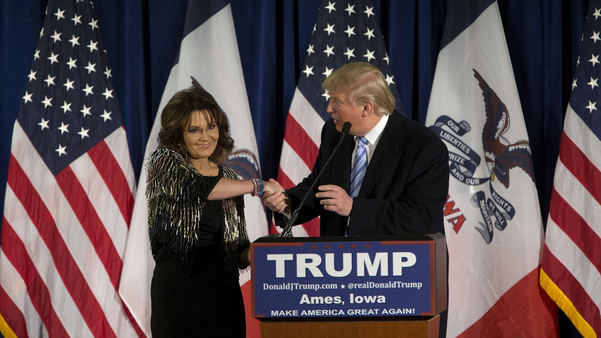 Republican presidential candidate Trump with former Alaska Gov. Sarah Palin on January 19, 2016 in Ames, IA.