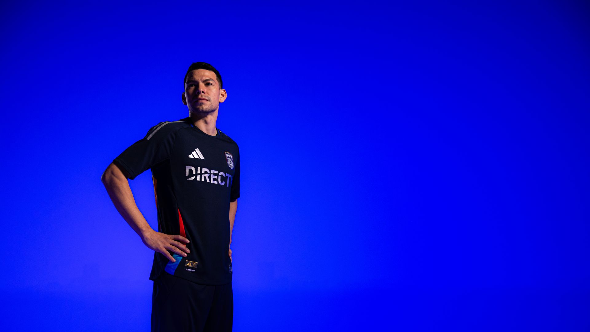 Hirving "Chucky" Lozano wearing SDFC's new jersey against a blue background