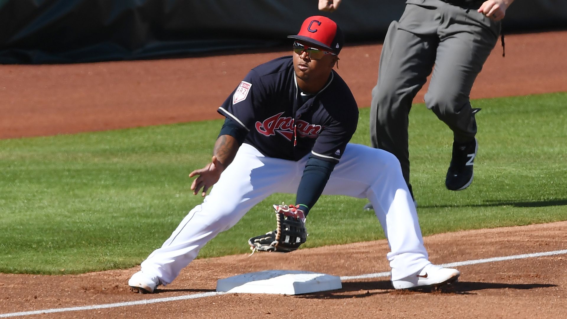 Jose Ramirez fielding a grounder