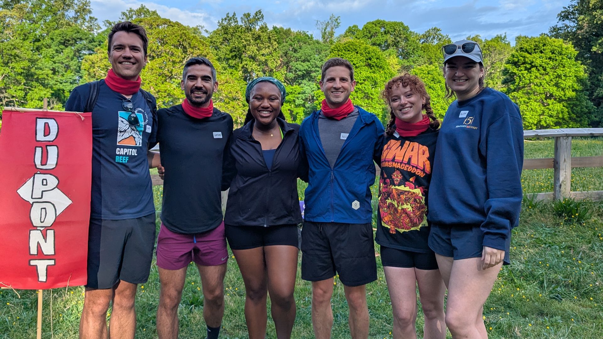 6 contestants pose for a picture before playing Survivor: Rock Creek Park