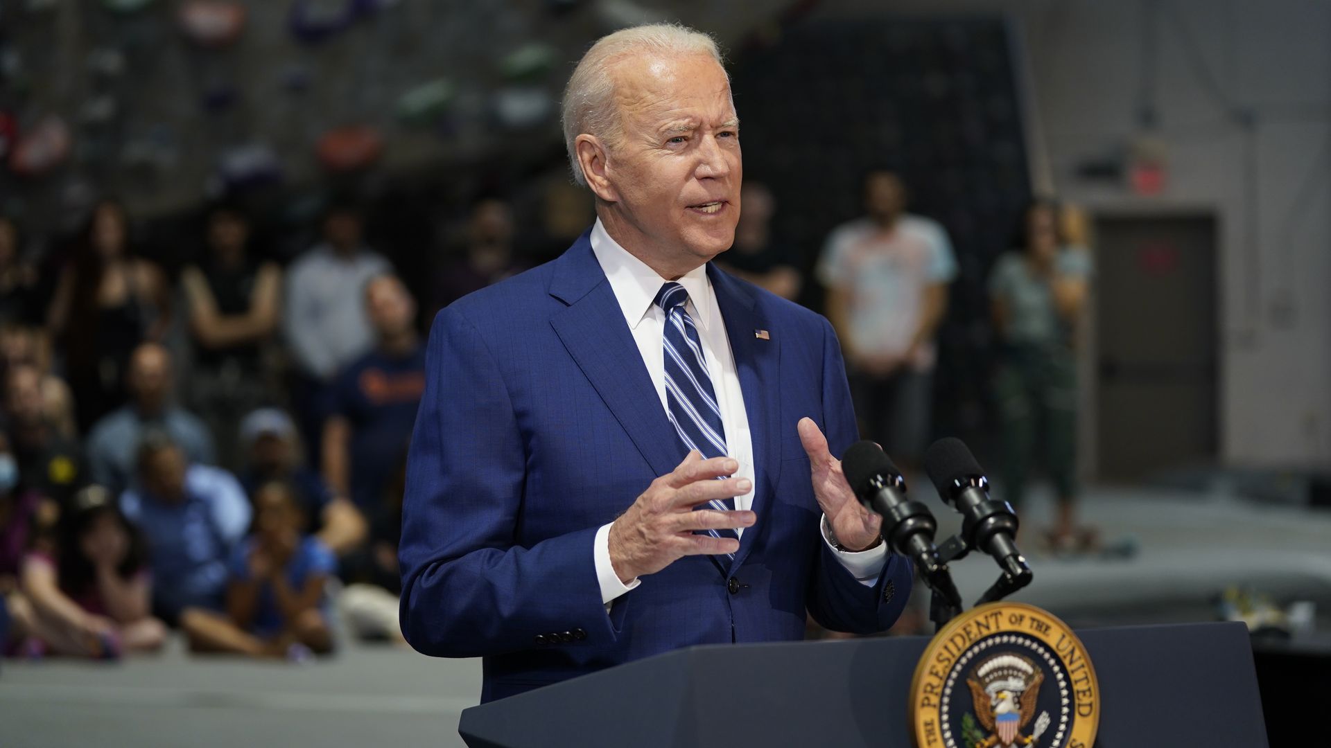 U.S. President Joe Biden speaks at Sportrock Climbing Center.