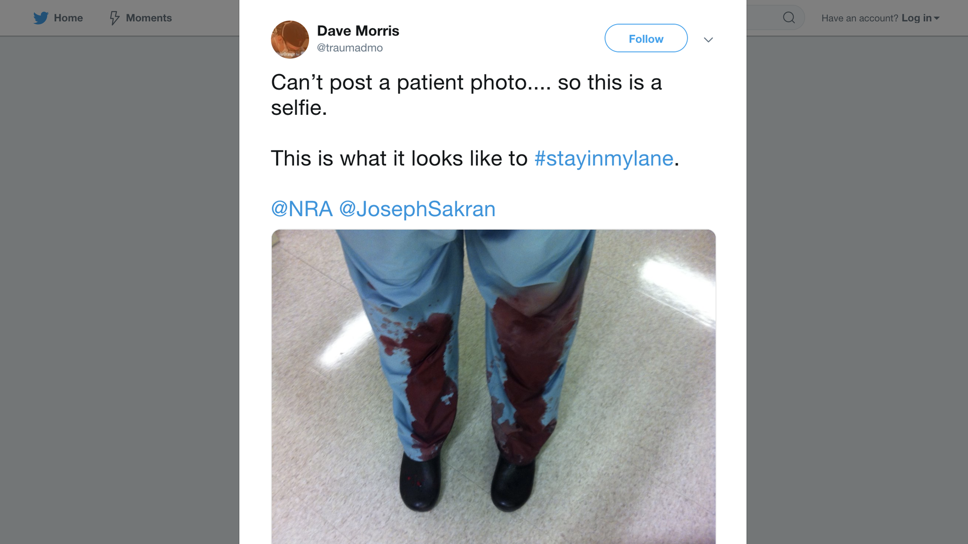 Image from a doctor's tweet with blood-stained pant legs