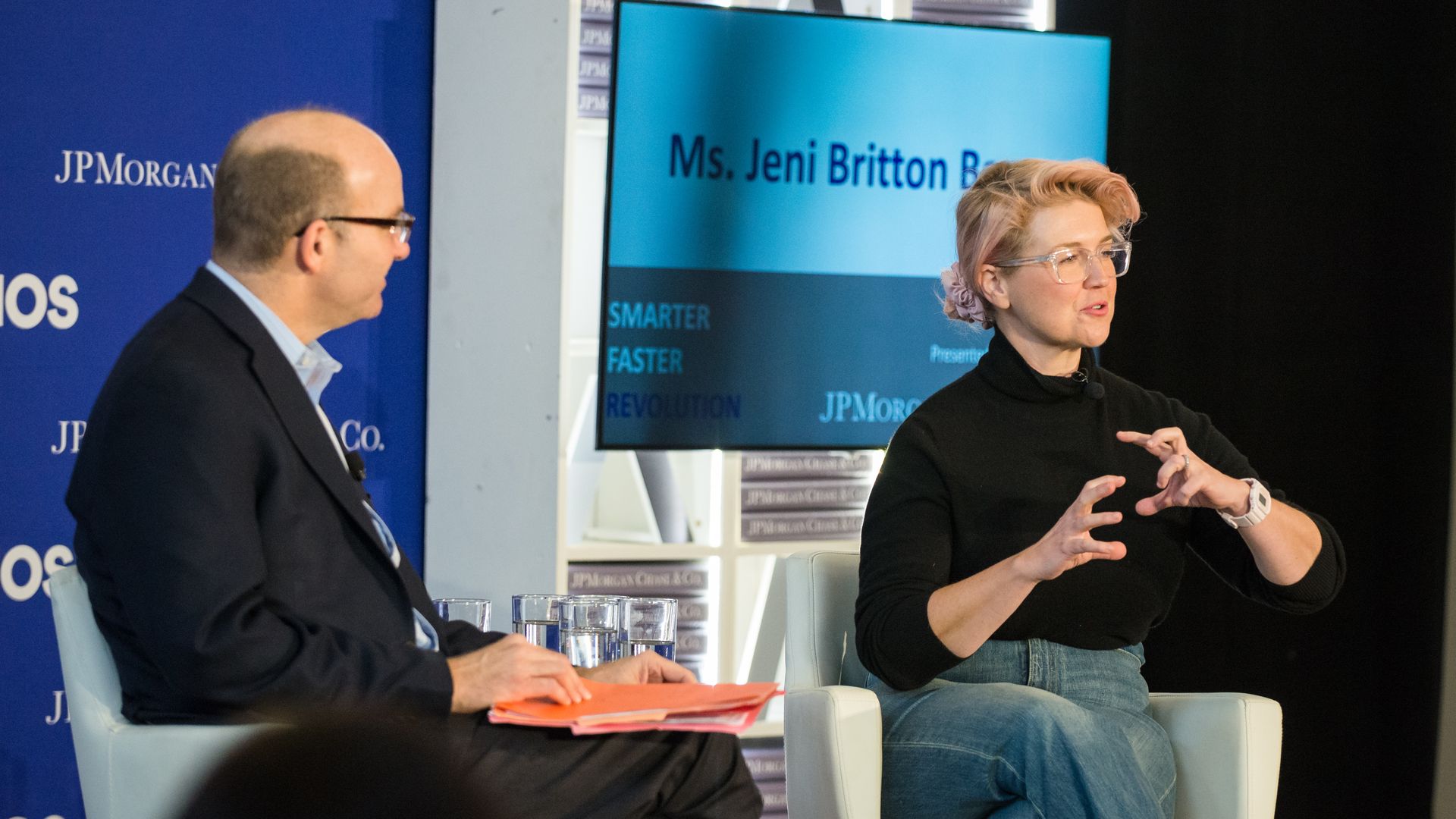 Jeni, who founded Jeni's Splendid Ice creams, uses her hands to demonstrate how ice cream is made. 