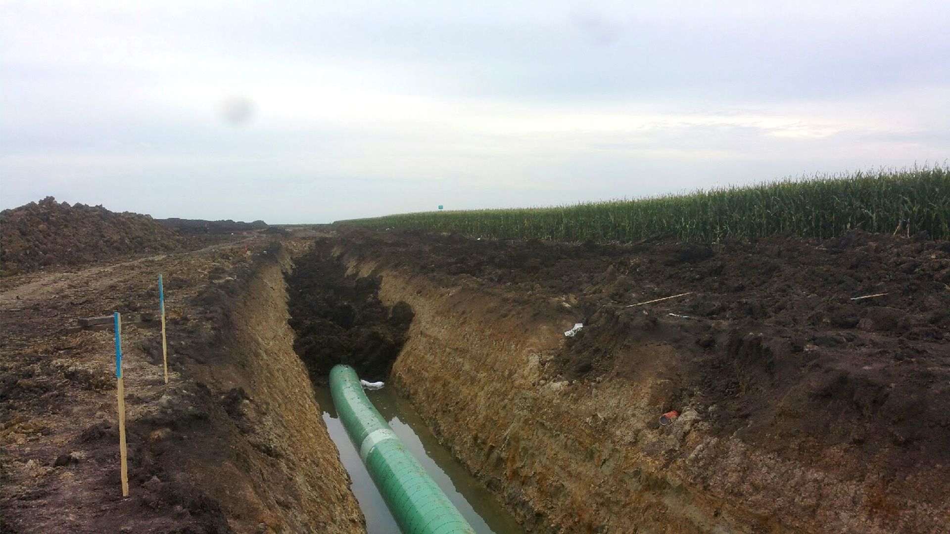 A photo of the Dakota Pipeline project through an Iowa field.