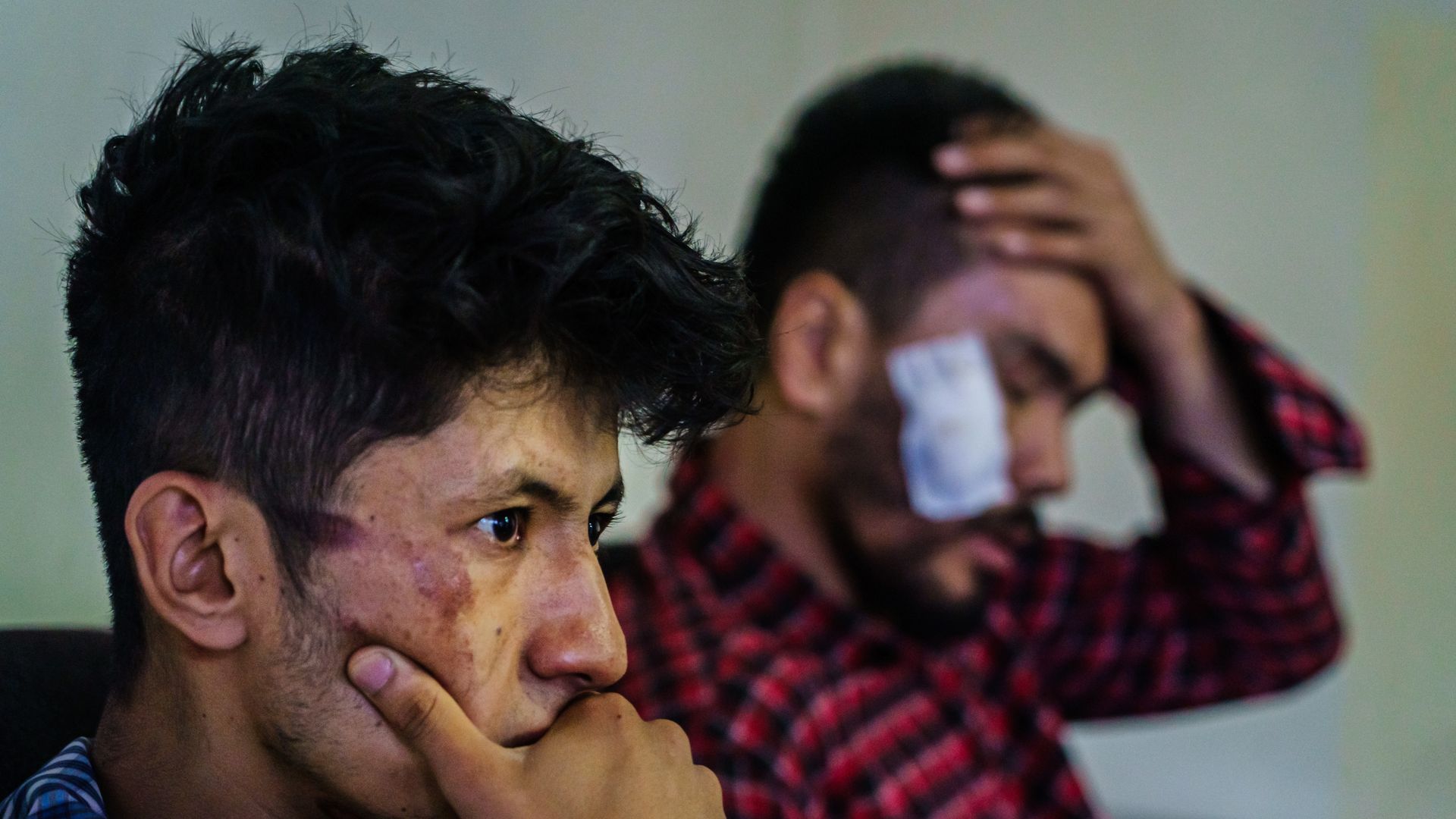 Journalists from the Etilaatroz newspaper, Taqi Daryabi, 22, video editor, left, and Nemat Naqdi, 28, a video journalist,