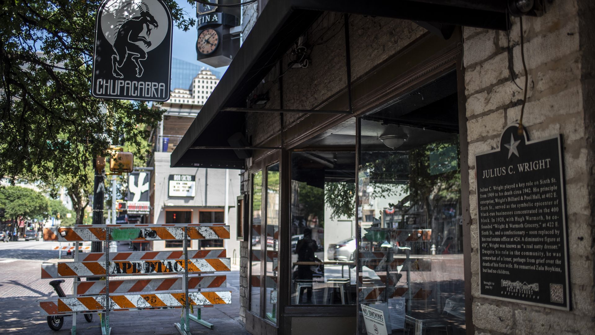  Police barricades sit unused near the scene of a shooting on June 12, 2021 in Austin, Texas. 