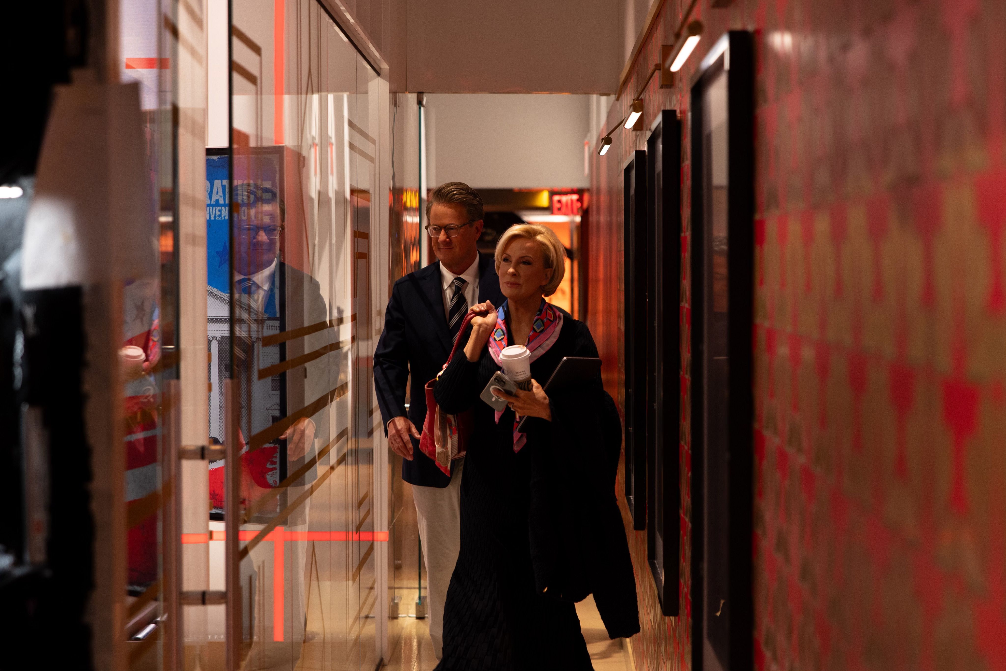 Joe Scarborough and Mika Brzezinski walk to the "Morning Joe" set at 30 Rock.