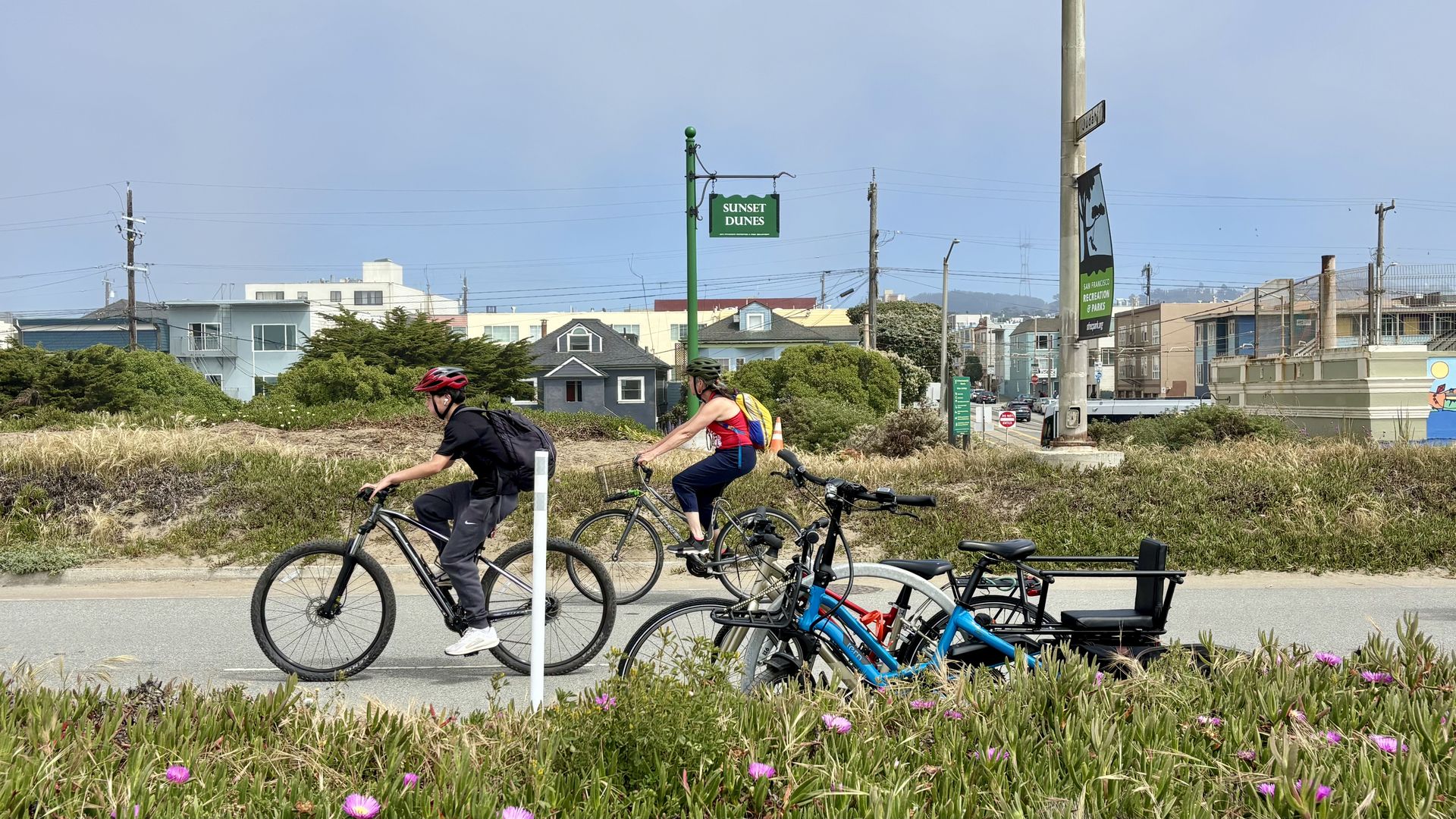 Bicyclists ride along Sunset Dunes, San Francisco's newest park.