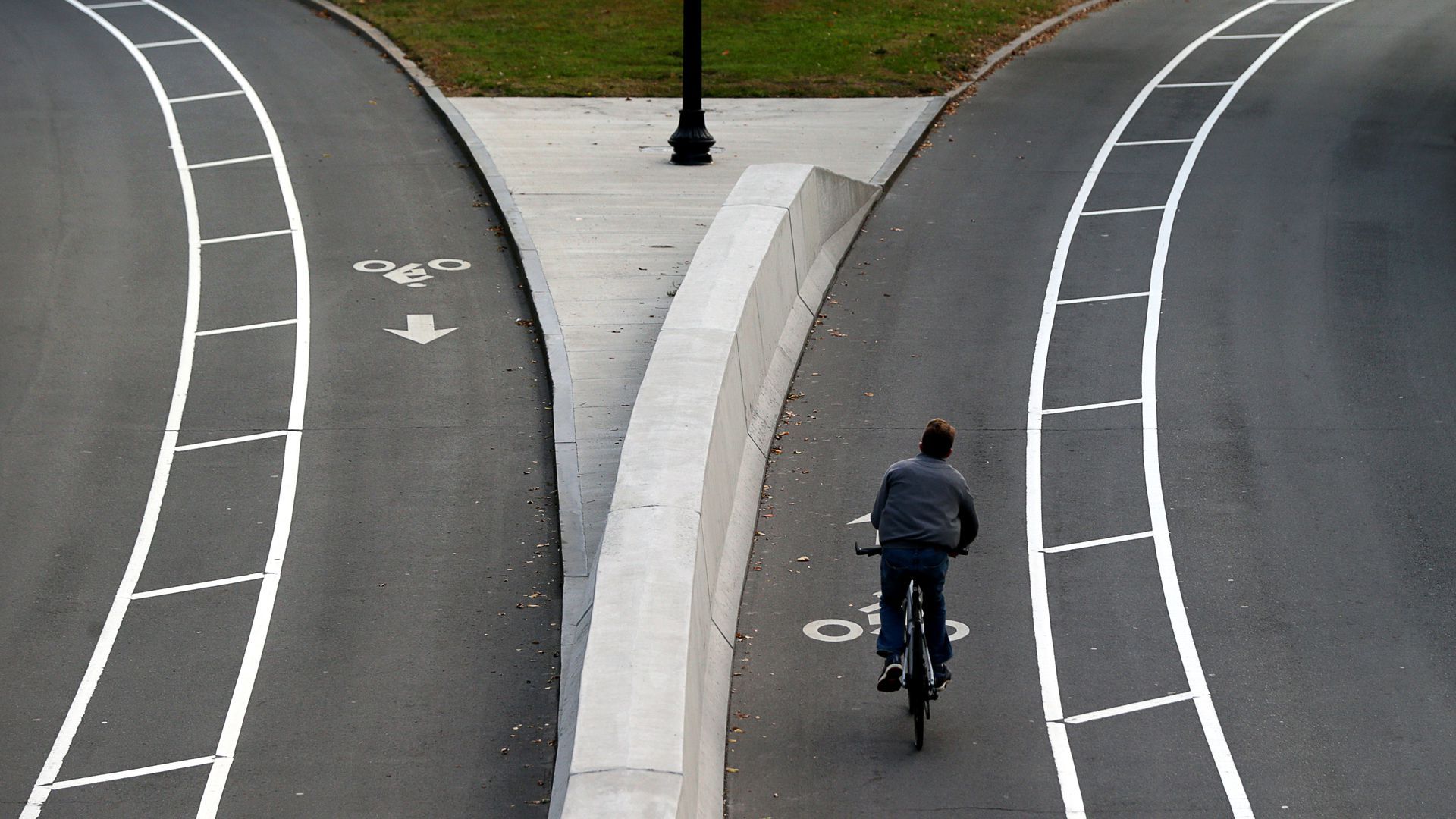 A cyclist on Commonwealth Avenue in Boston.