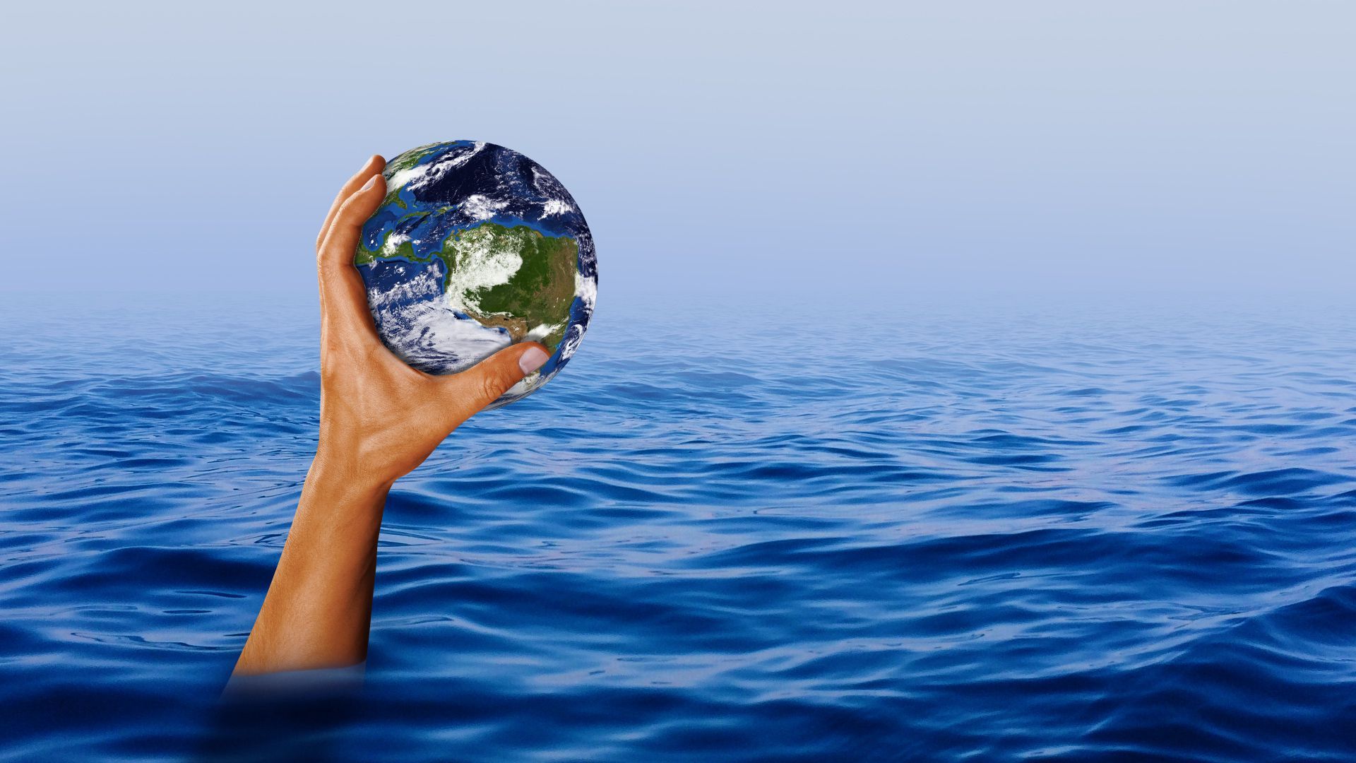 Illustration of a hand holding up an Earth above rising water.
