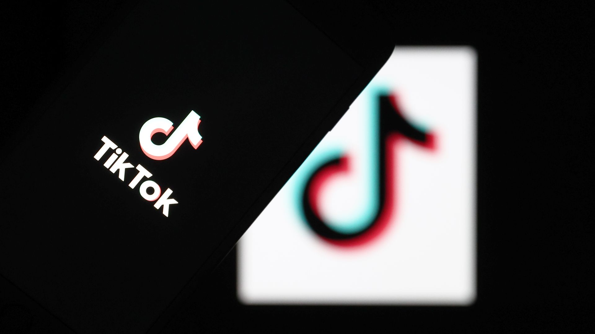TikTok logo is displayed on a smartphone and a PC screen in Ankara, Turkey on May 11, 2021. (Photo by Rasit Aydogan/Anadolu Agency via Getty Images)