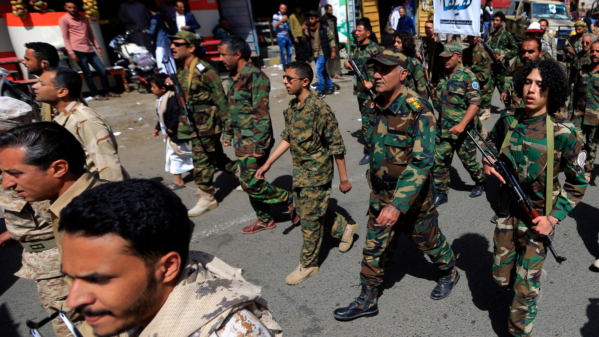Forces loyal to Yemen's Houthi rebels march in a military parade in Saana.