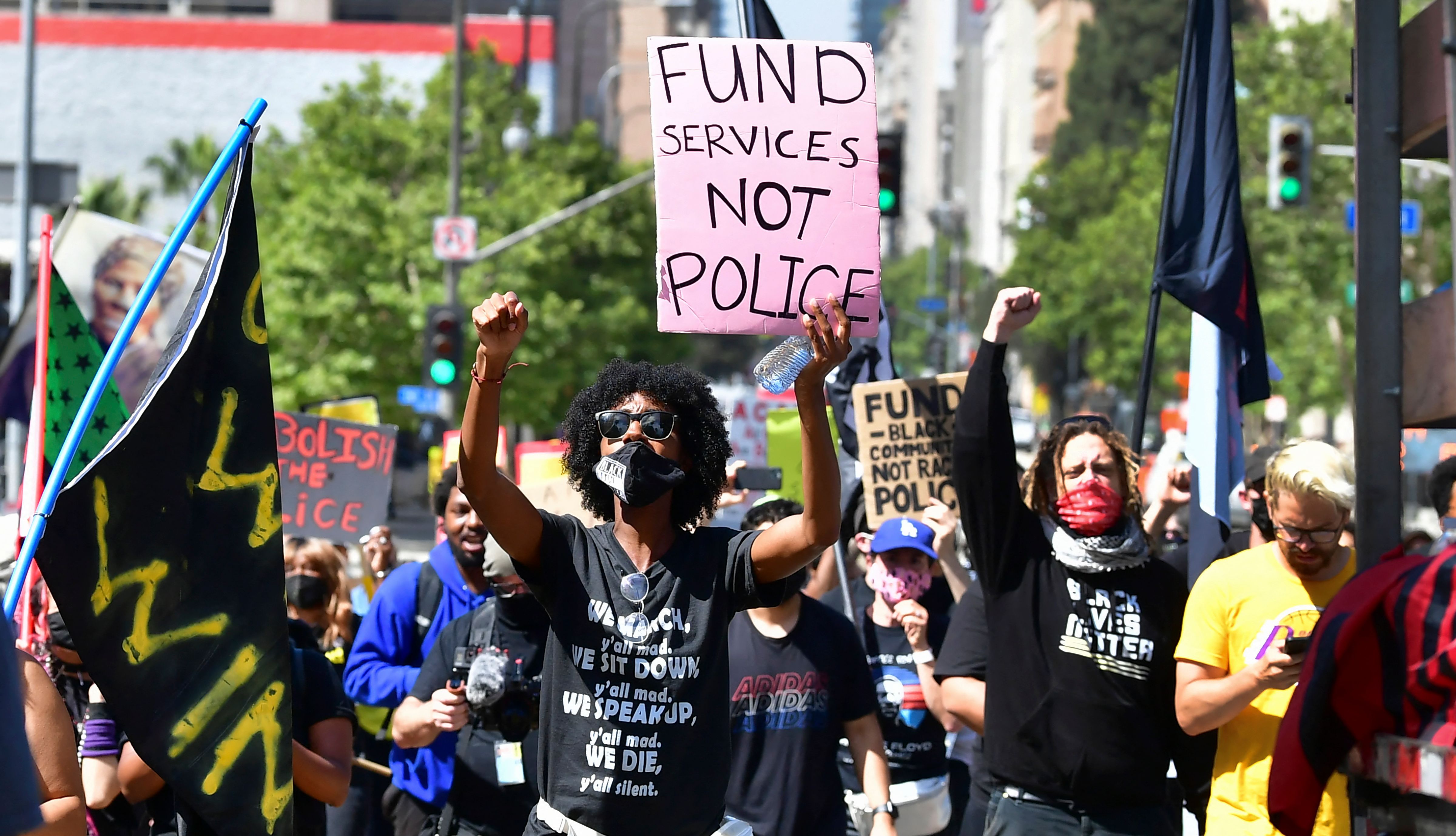 Activists and supporters of Black Lives Matter, march in Los Angeles