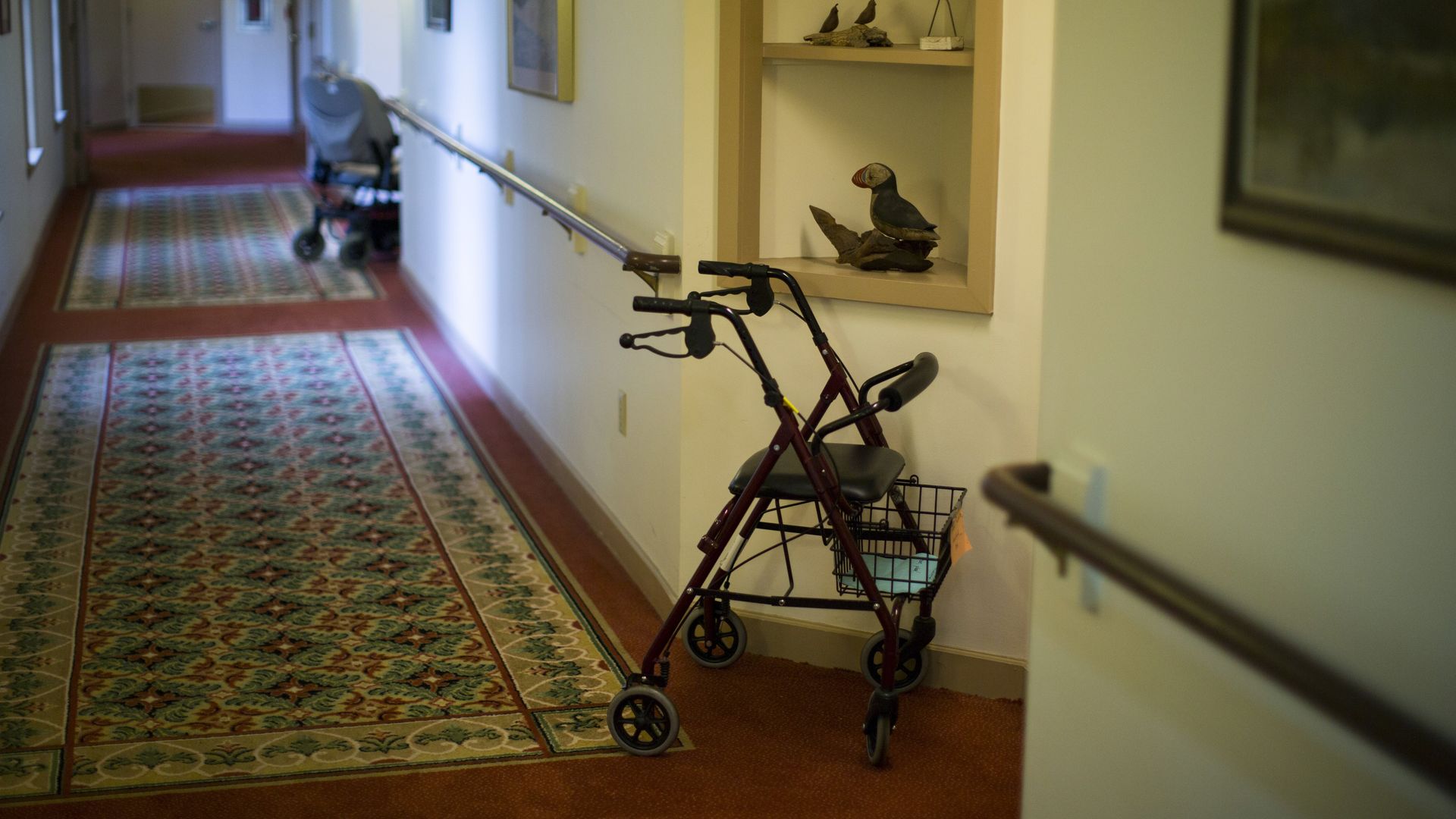 A walker and an electric wheelchair in a nursing home