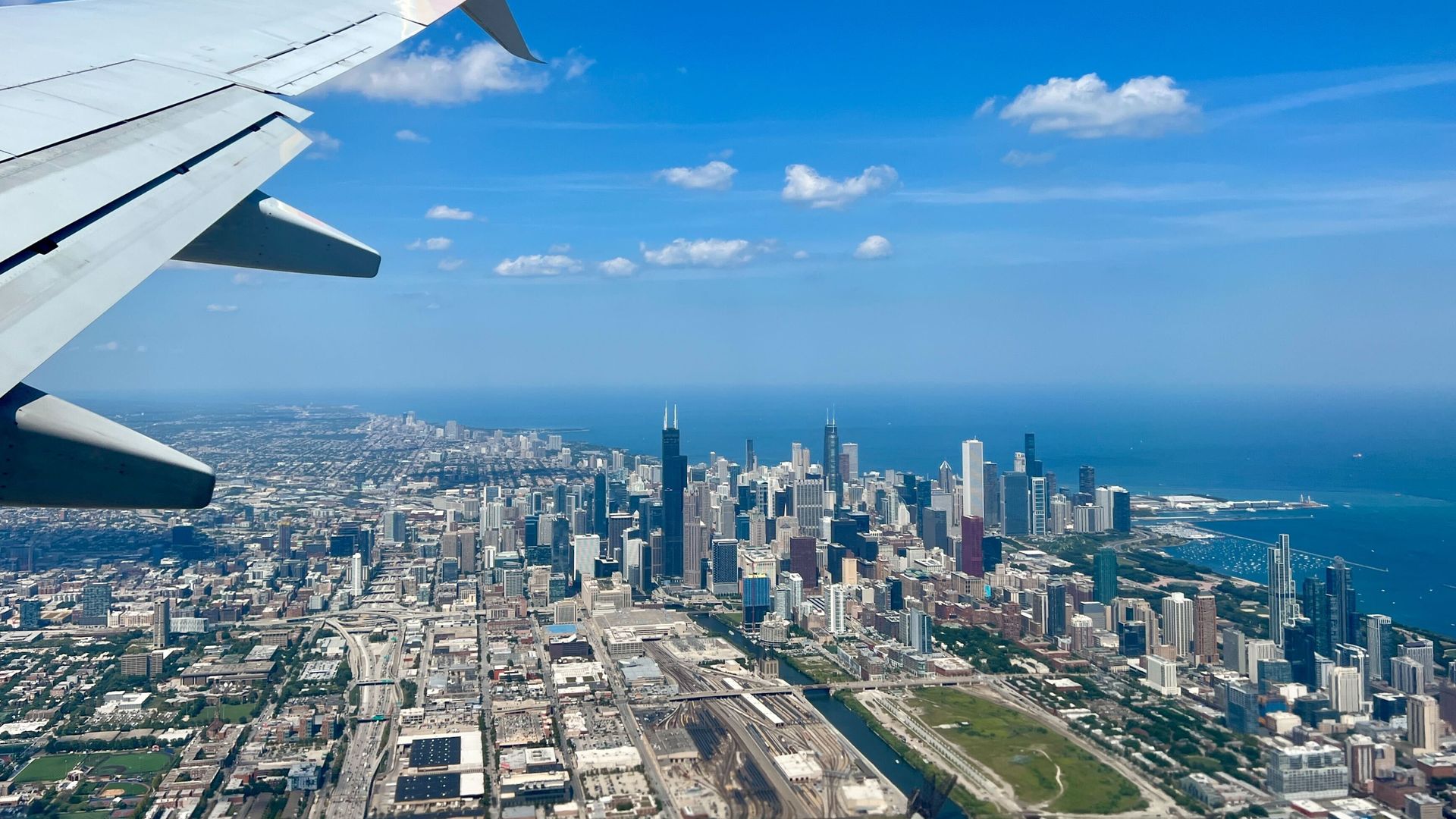 Photo of a city out of a airplane window. 