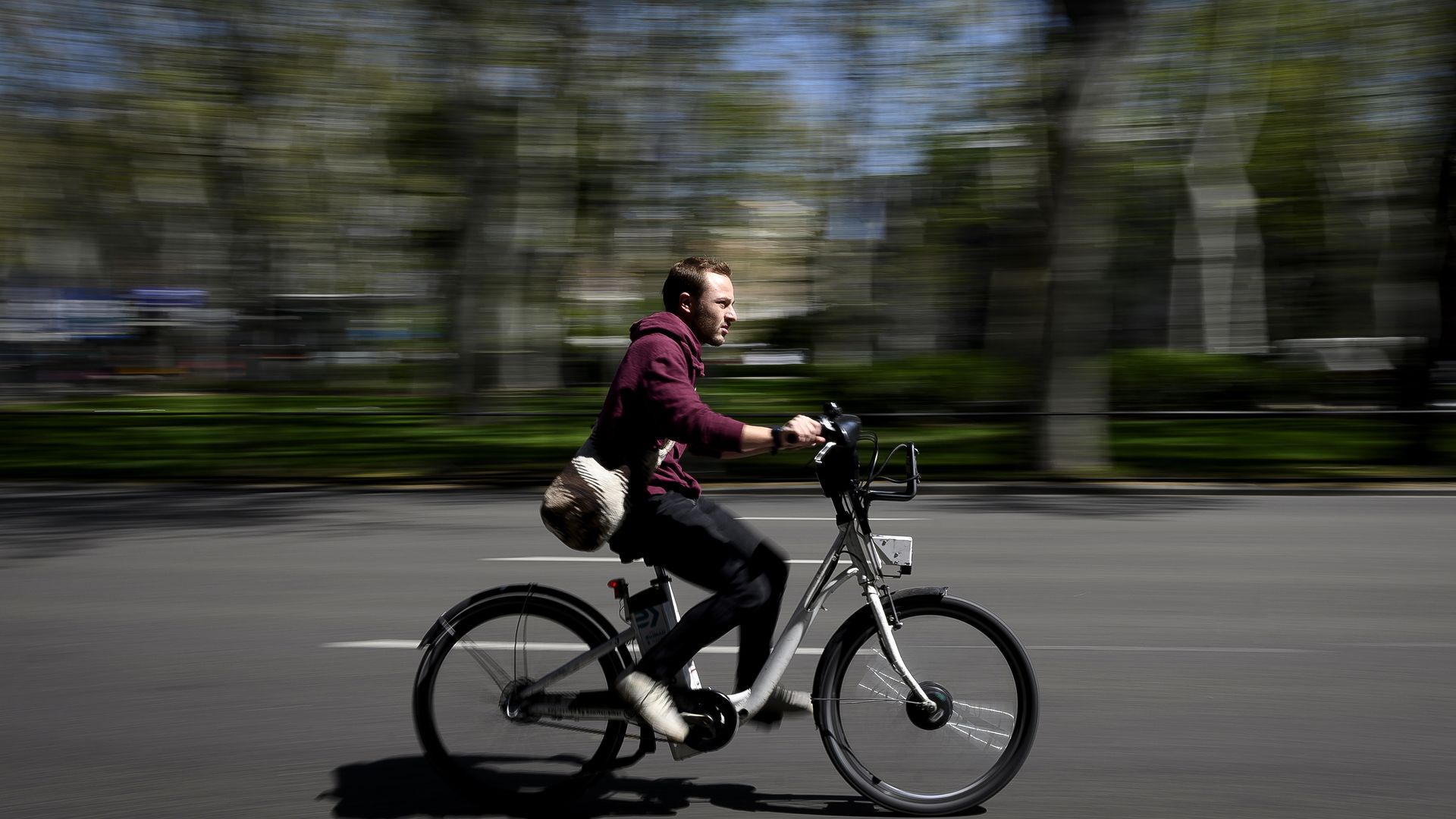Man rides electronic bike in Madrid, Spain