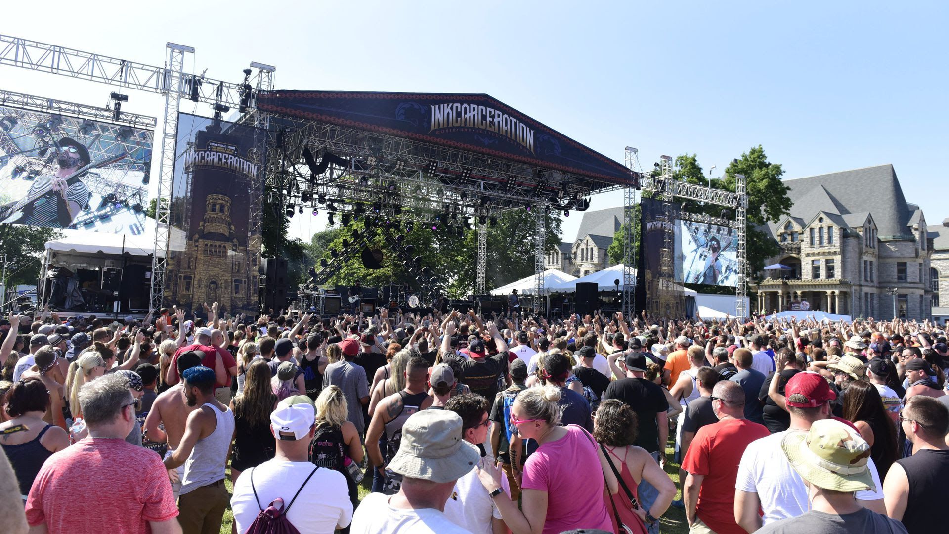 A large crowd gathers near the stage at the 2019 Inkcarceration music festival.