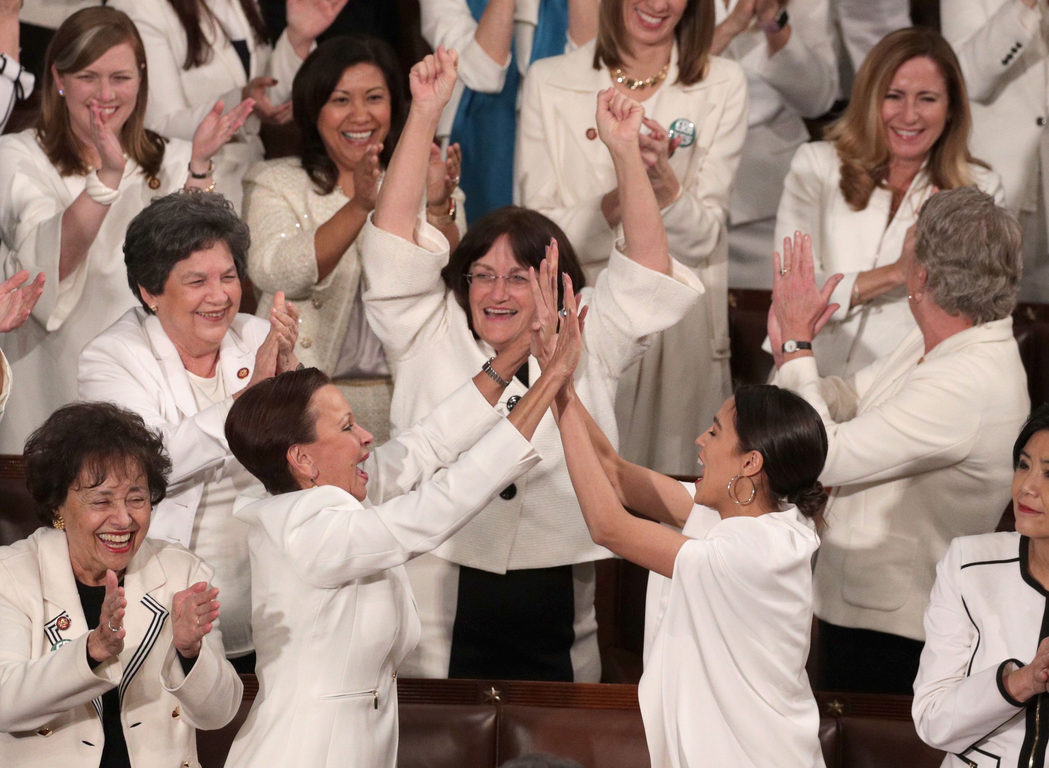 Female lawmakers cheer