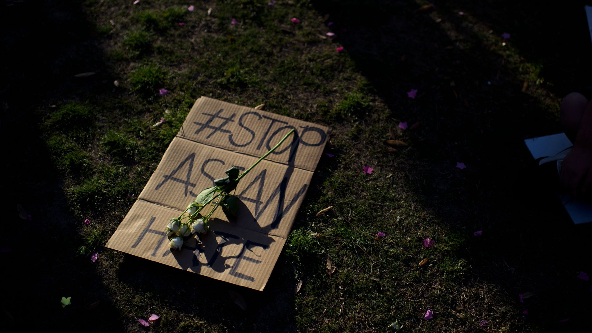 Stop Asian Hate sign on the ground