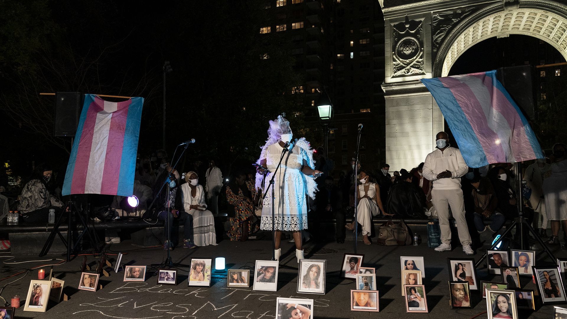 People rally and hold vigil on transgender day of remembrance to commemorate lost lives on Washington Square.
