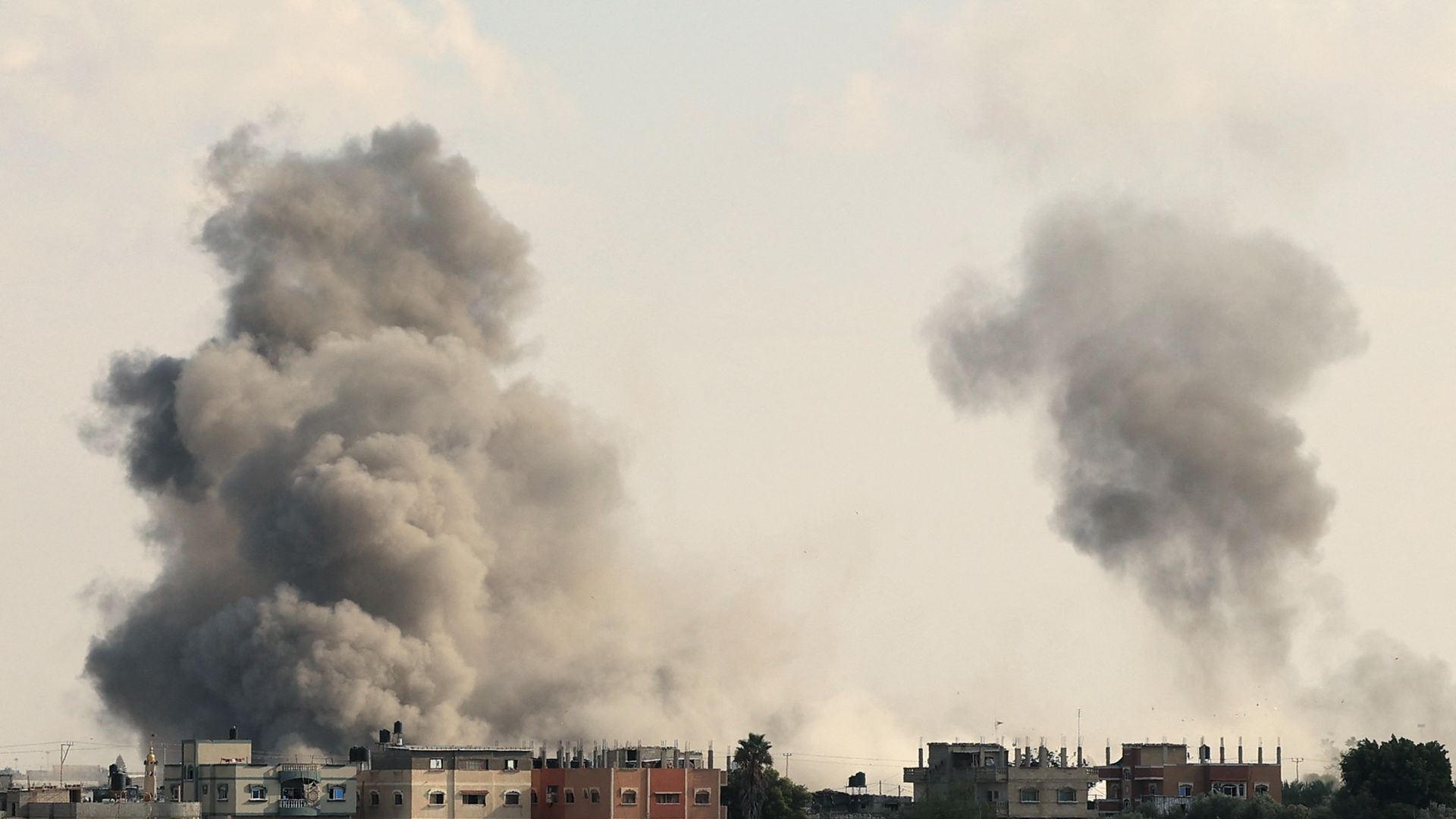 Smoke billows from the Gaza's Rafah border crossing with Egypt during an Israeli airstrike on October 10, 2023. 