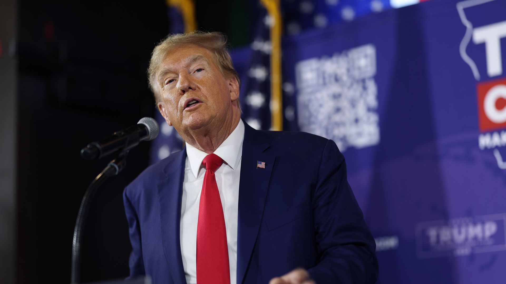 Republican presidential candidate former President Donald Trump speaks at a commit to caucus campaign event at the Whiskey River bar on December 02, 2023 in Ankeny, Iowa.