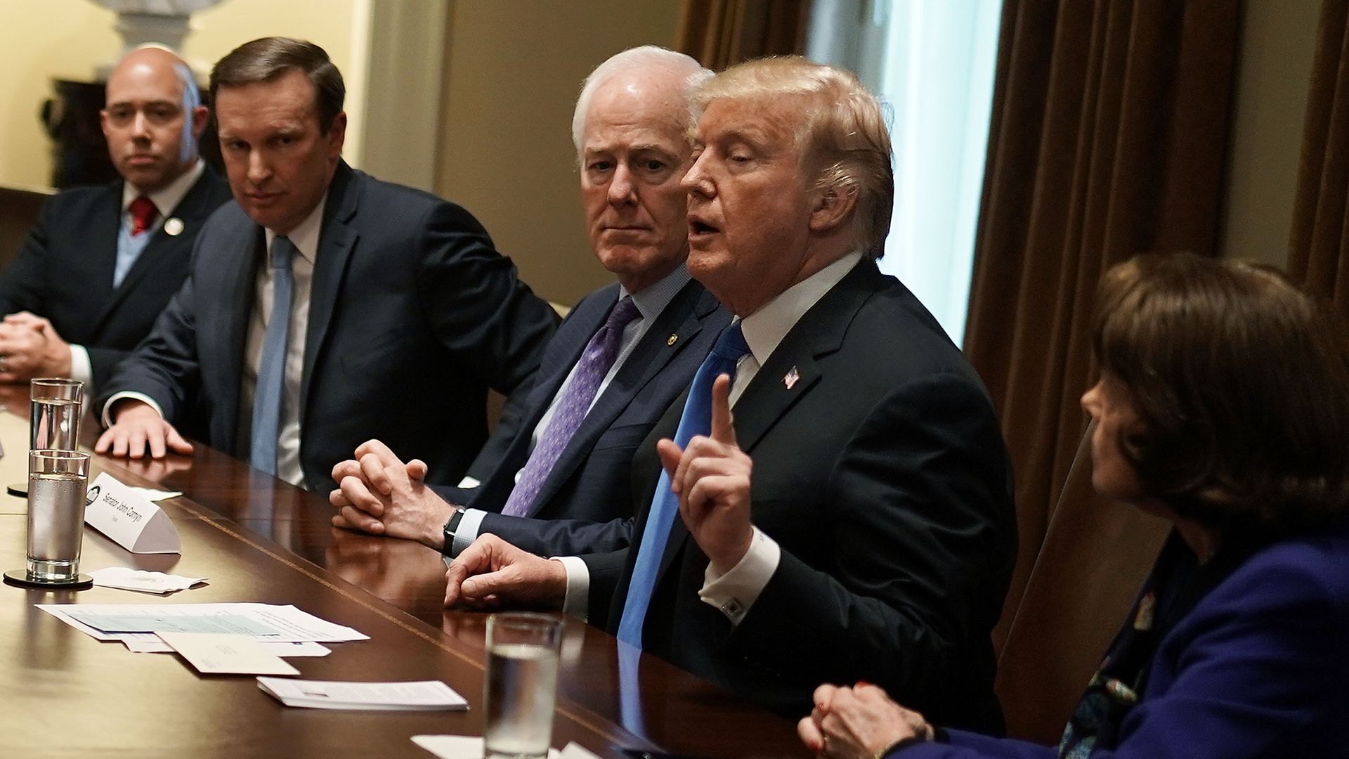 President Trump meeting with lawmakers on gun policy.