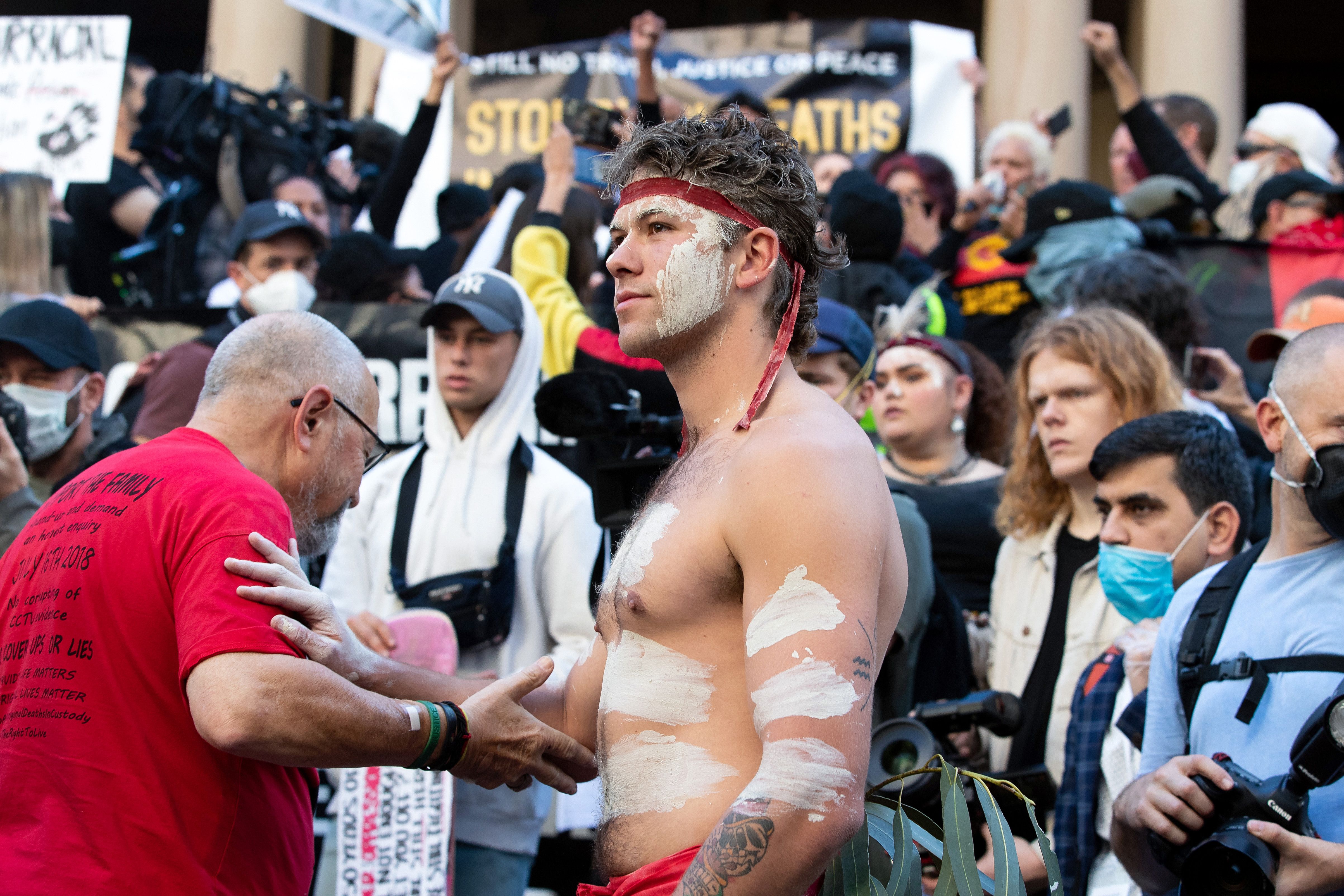 Traditional indigenous welcoming ceremony at rally outside Sydney Town Hall on 06 Jun