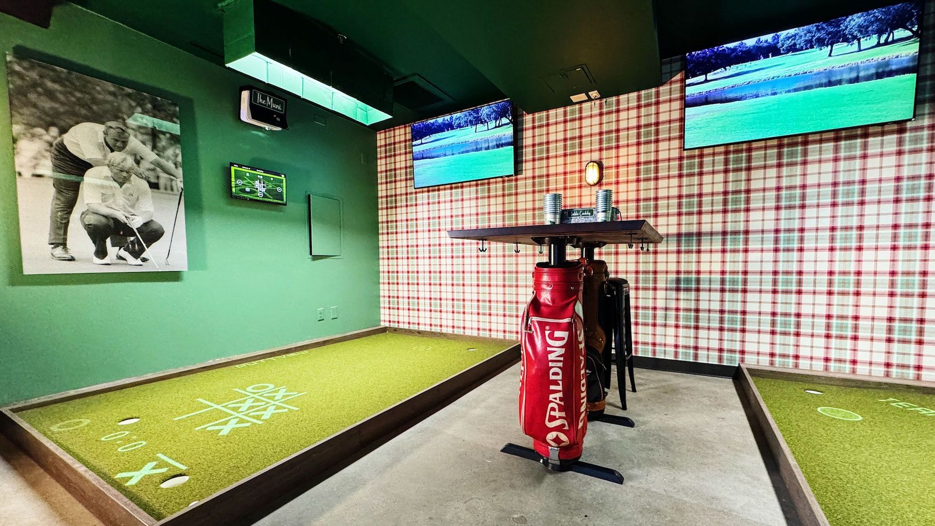 Golf simulators in a retro bar 
