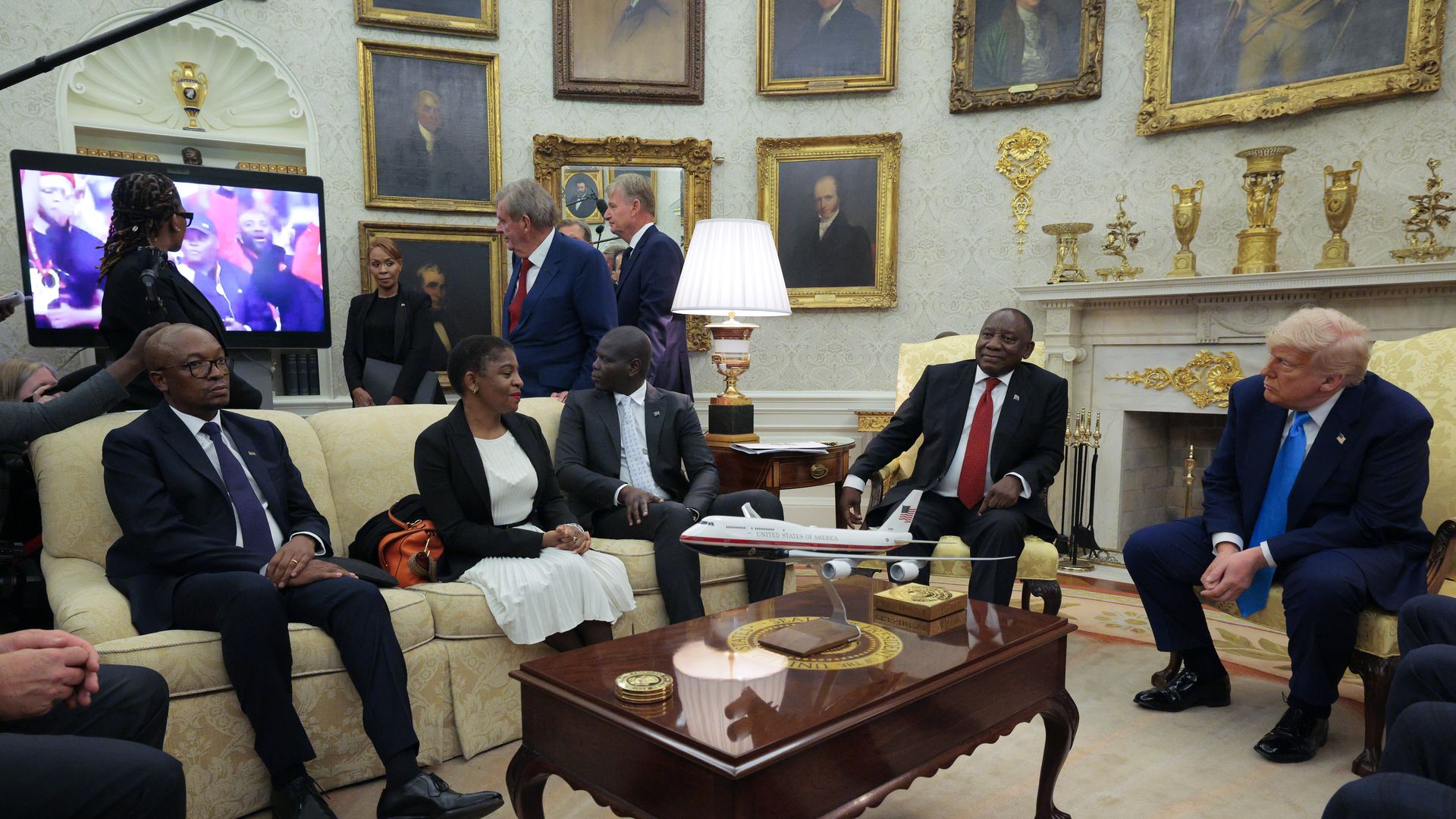 President of South Africa Cyril Ramaphosa (2nd-R) and U.S. President Donald Trump (R) look on as a video plays in the Oval Office of the White House on May 21, 2025 in Washington, D.C.