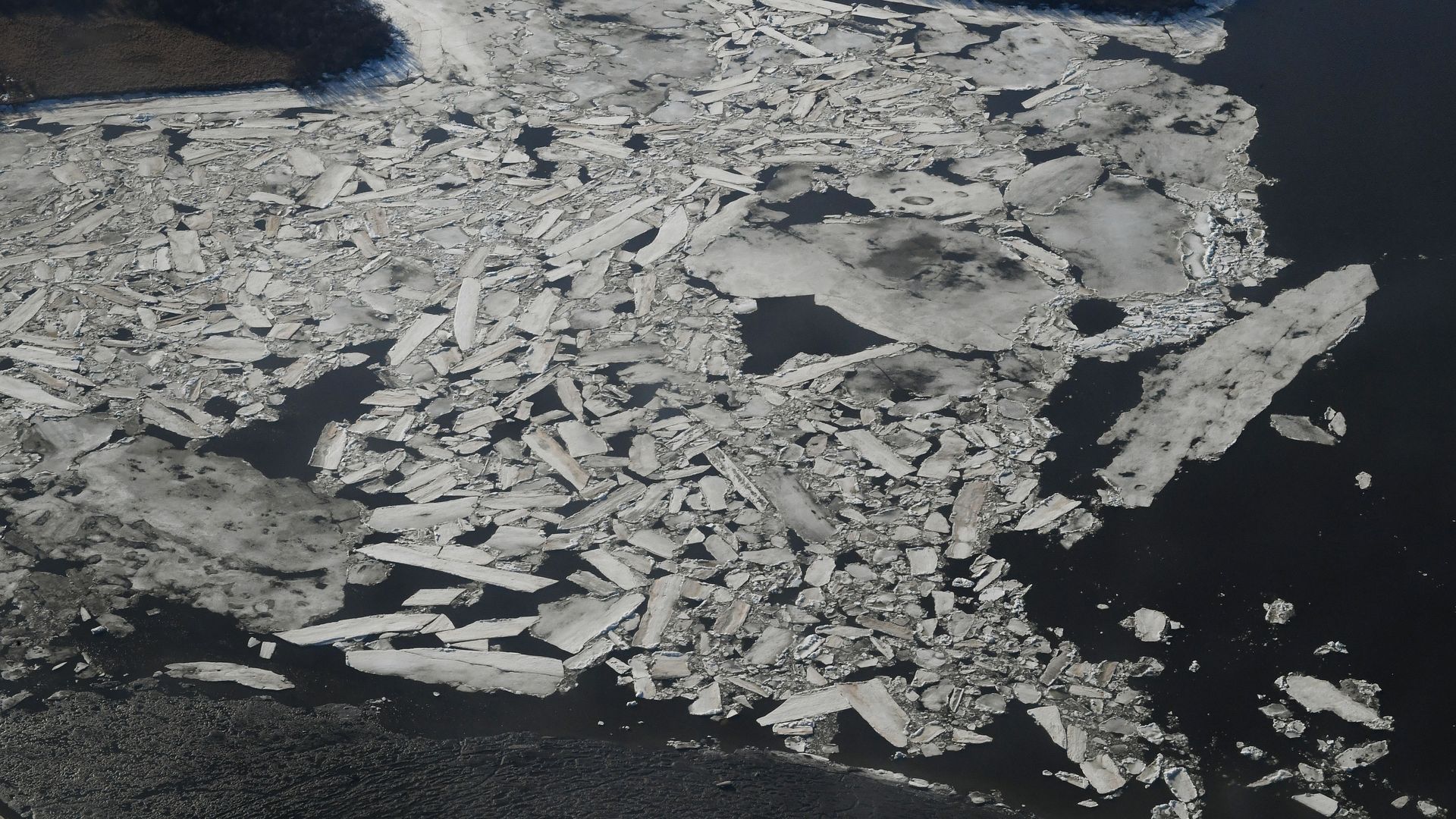 This photo is a birds eye view of melting ice in Alaska.