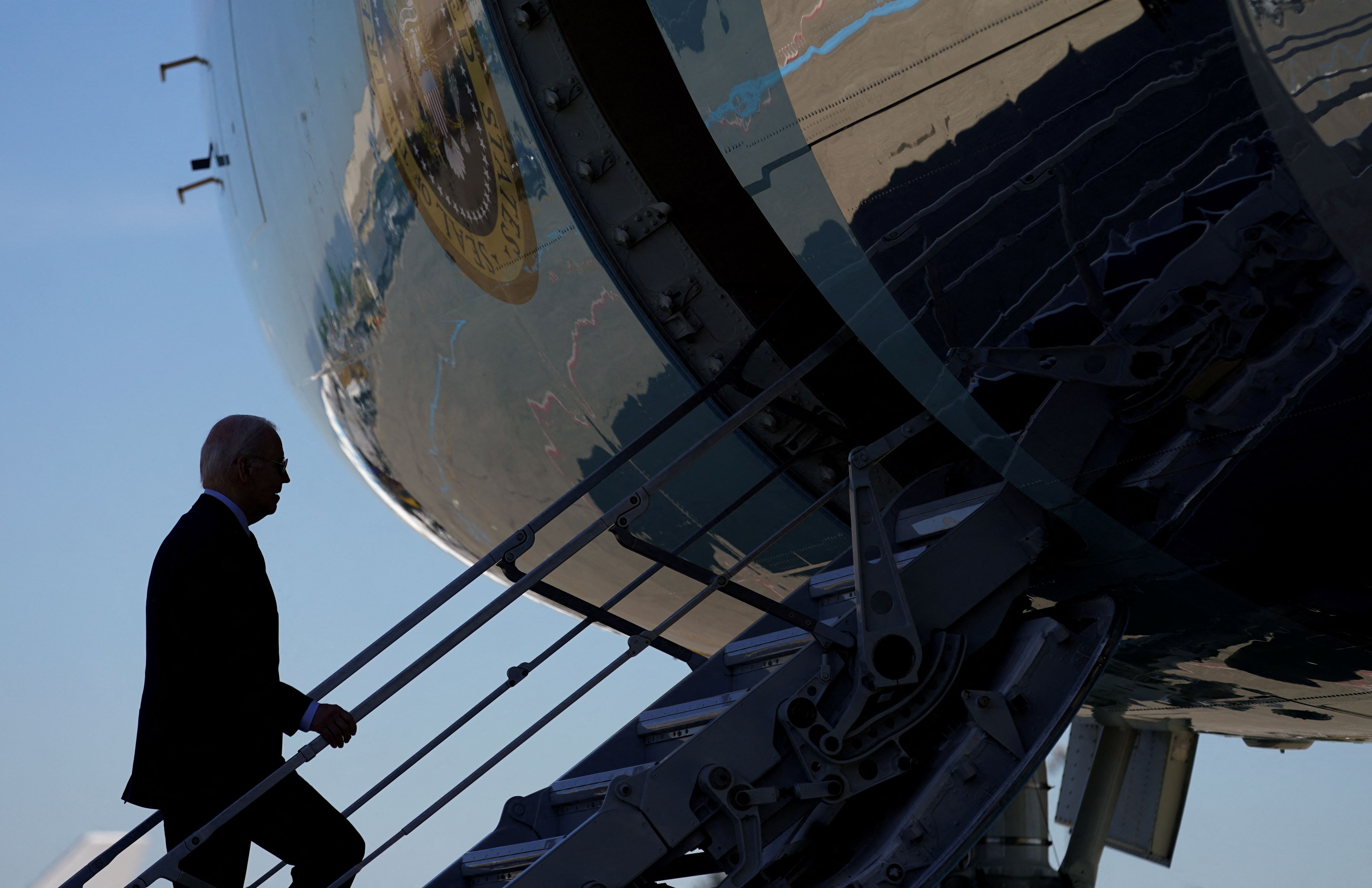 President Biden boards Air Force One as he departs Seattle on Saturday.