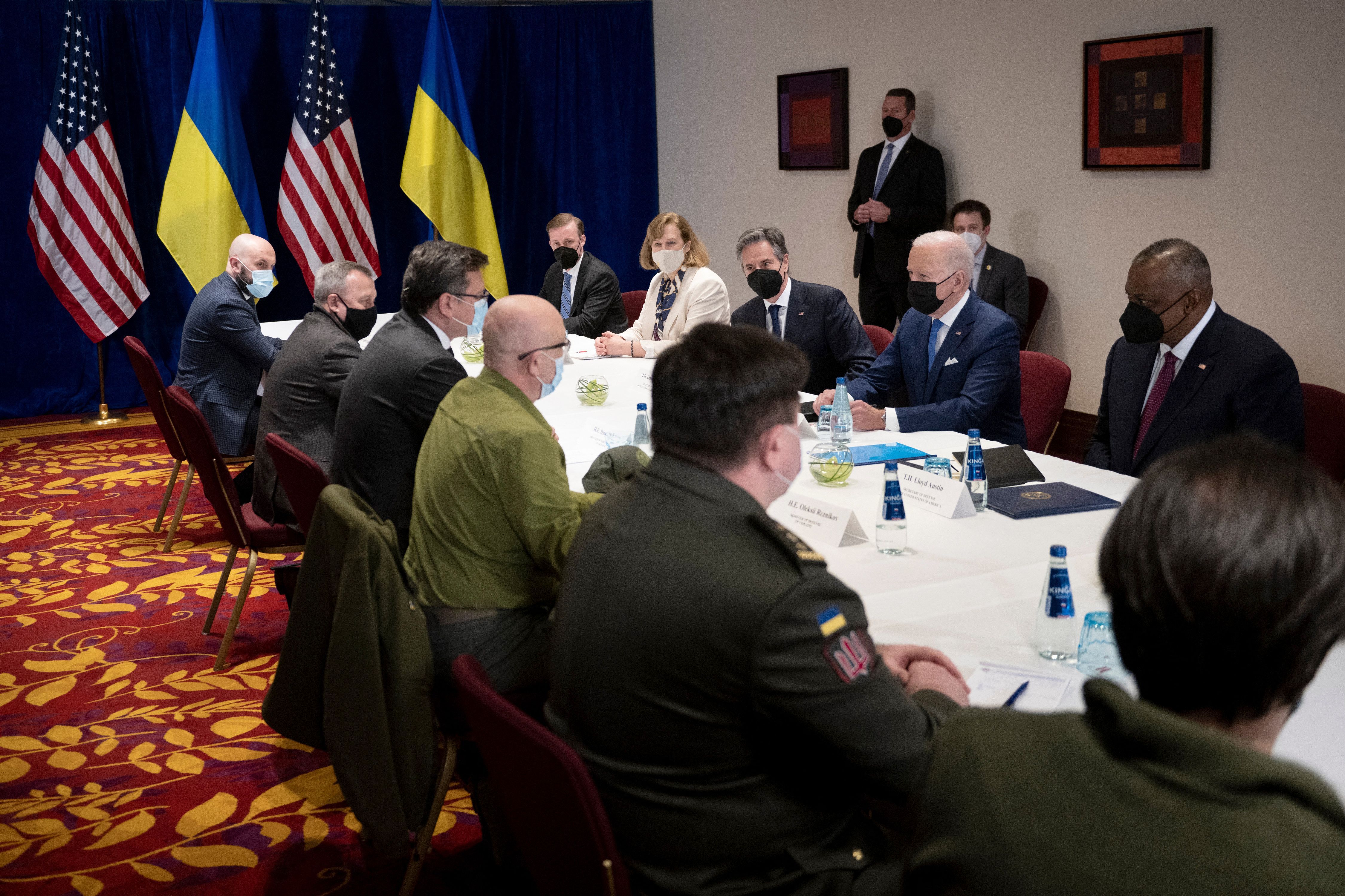 President Joe Biden (back 2ndR) together with US Secretary of State Antony Blinken (back 3rdR) and US Defence Secretary Lloyd Austin (back R) attend a meeting on Russia's war in Ukraine.