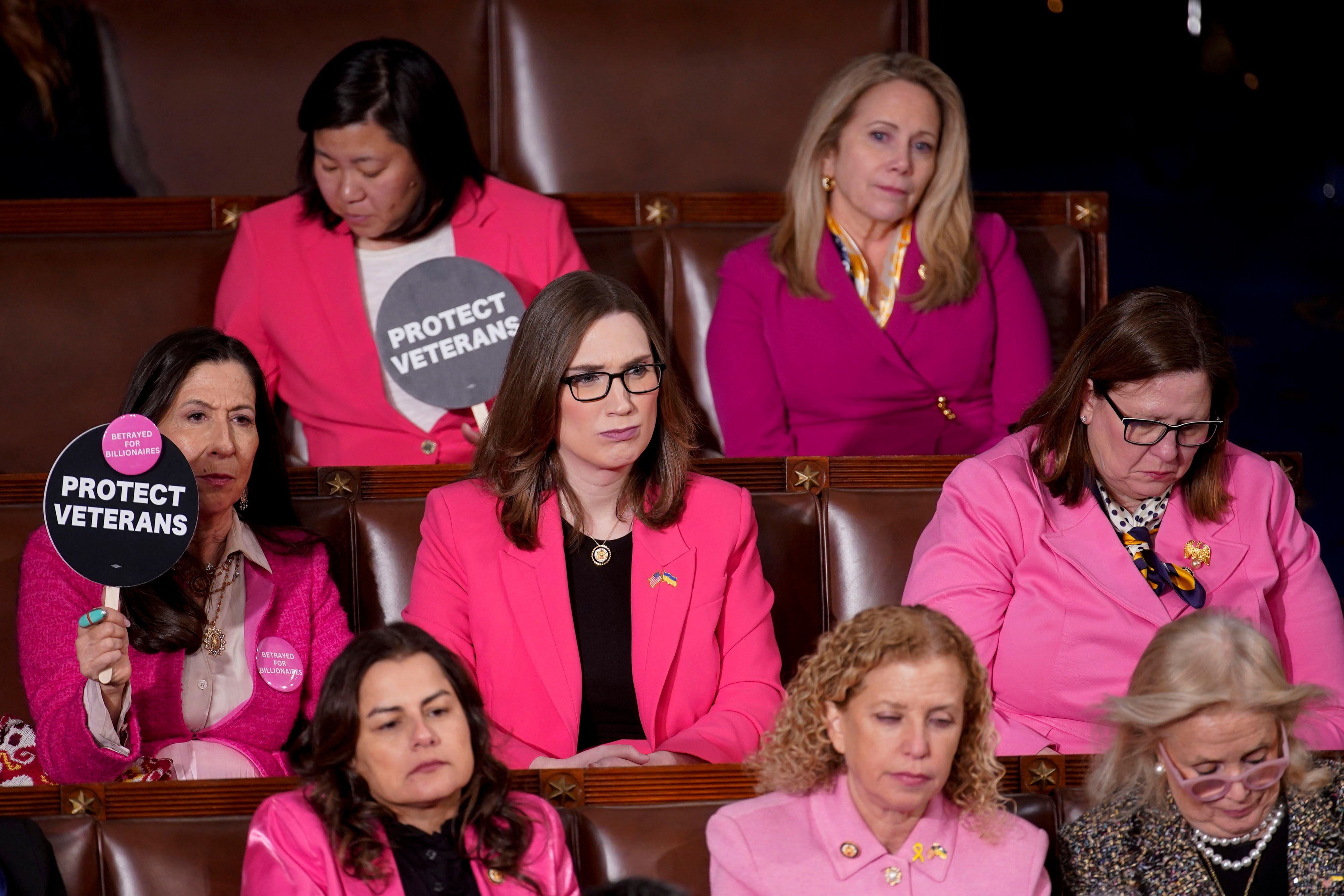 House Democrats wear pink in protest during a joint session of Congress in the House Chamber of the US Capitol in Washington, DC, US, on Tuesday, March 4, 2025. 