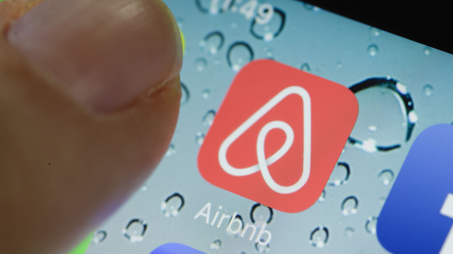Photo of close-up icon of Airbnb's mobile app. 