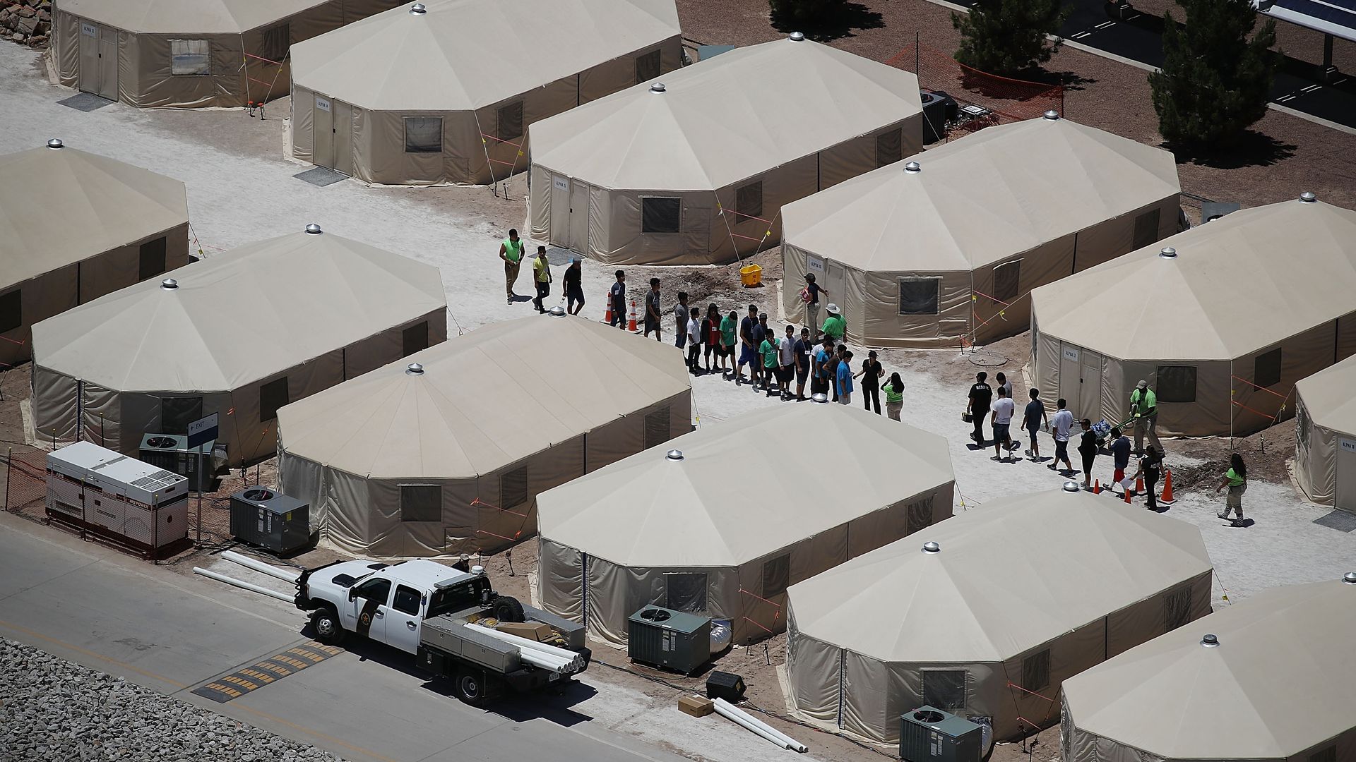 Children and workers at a tent encampment near the Tornillo Port of Entry in Tornillo, Texas. Photo: Joe Raedle/Getty Images