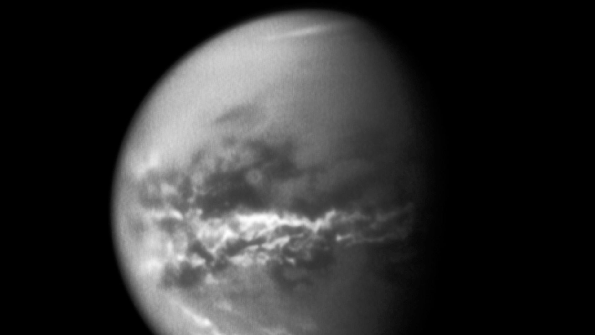 NASA's Cassini spacecraft chronicles the change of seasons as it captures clouds concentrated near the equator of Saturn's largest moon, Titan.