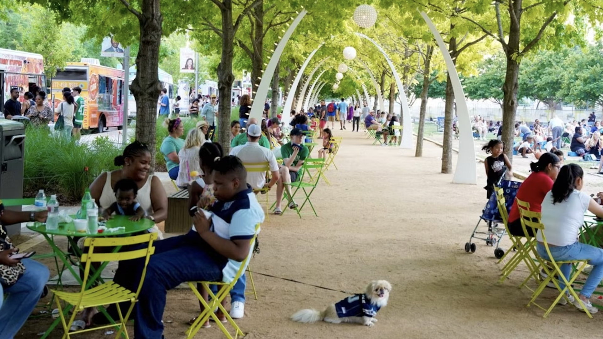 public park dallas with people sitting around tables